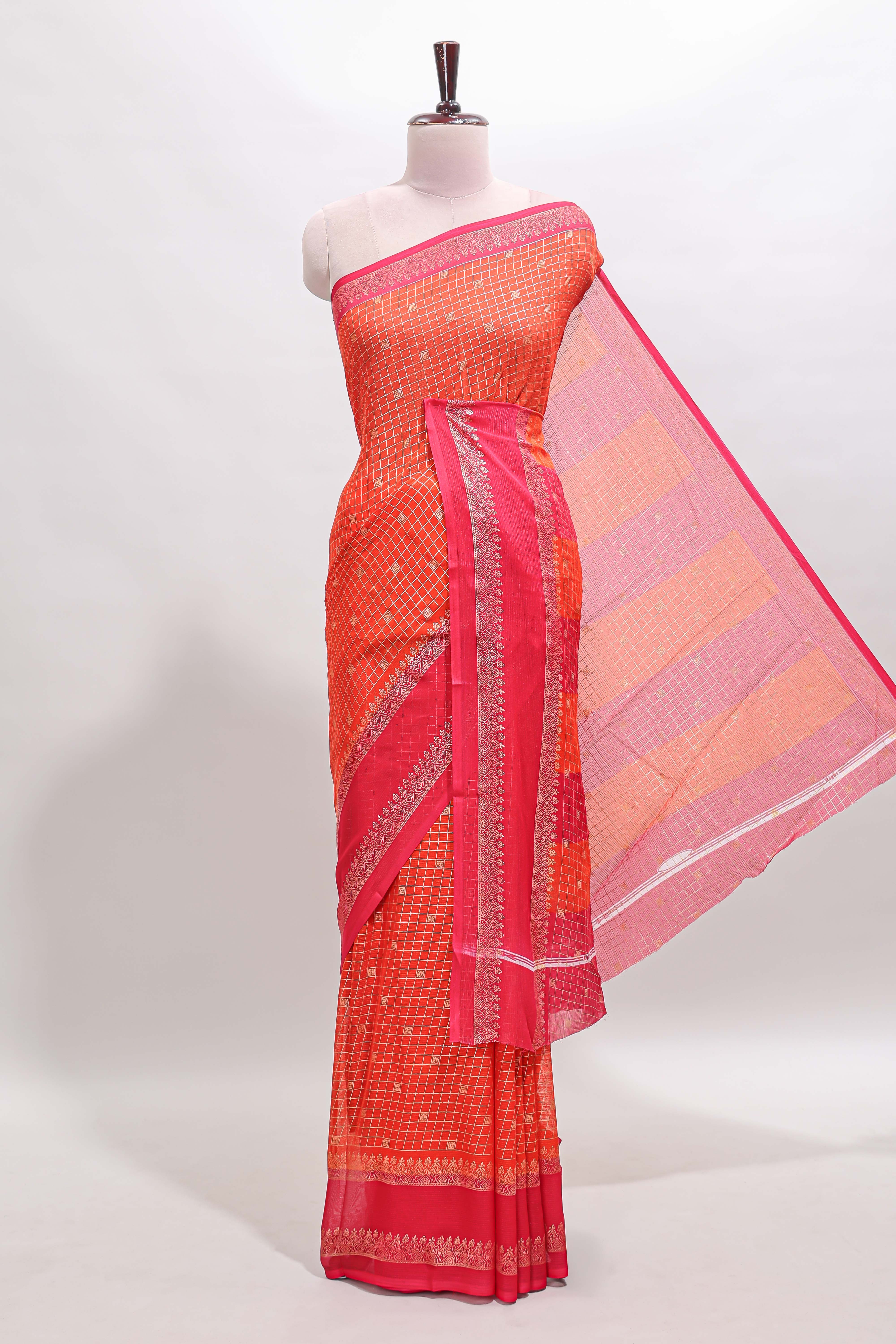 Orange checked semi soft silk saree with contrast border and striped pallu