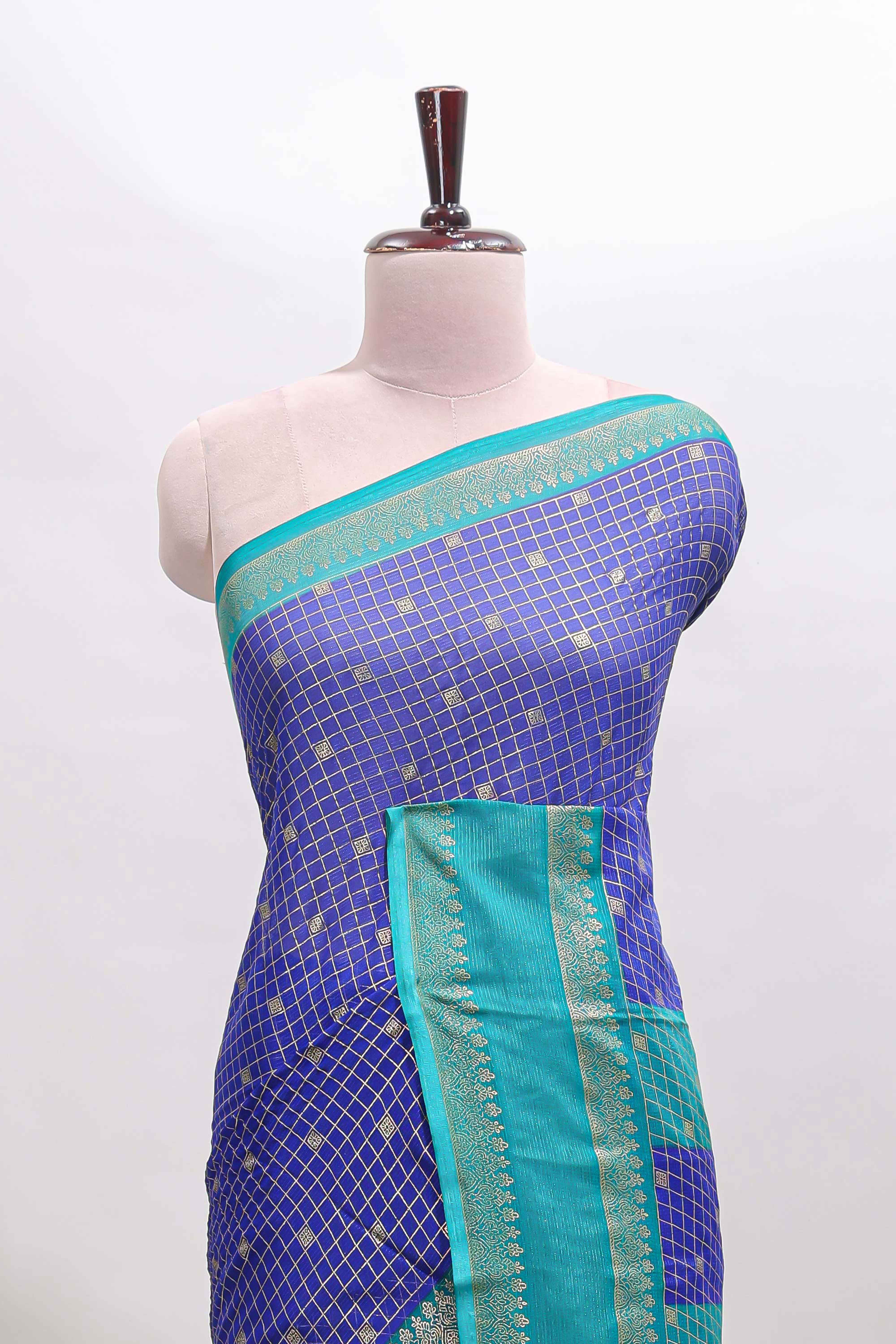 Royal blue checked semi soft silk saree with contrast border and striped pallu