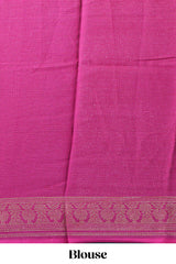 Dark green color budget silk saree with contrast foil print border and contrast pallu along with contrast blouse piece