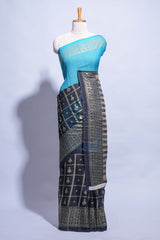 Blue color budget silk saree with contrast foil print border and contrast pallu along with contrast blouse piece