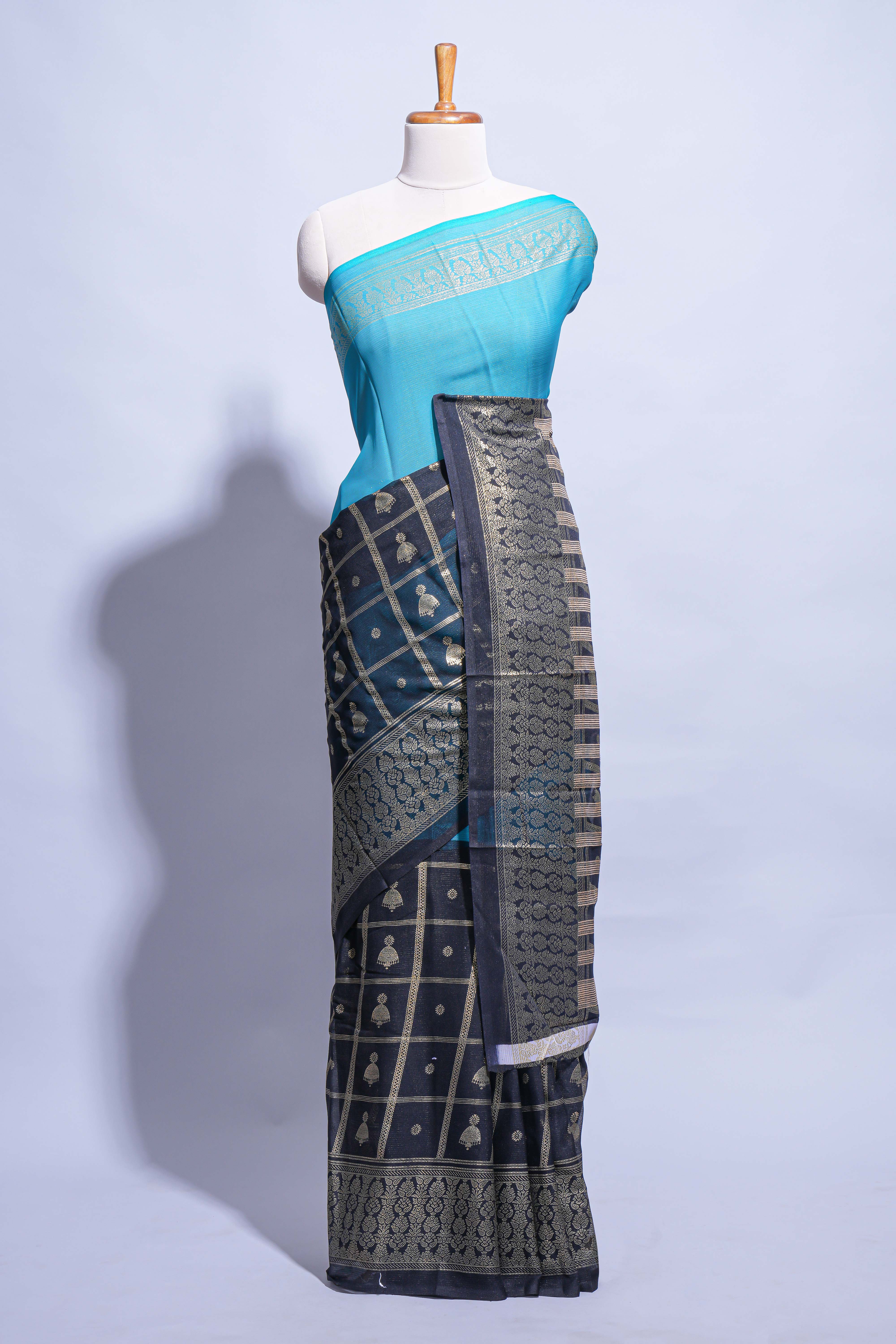 Blue color budget silk saree with contrast foil print border and contrast pallu along with contrast blouse piece