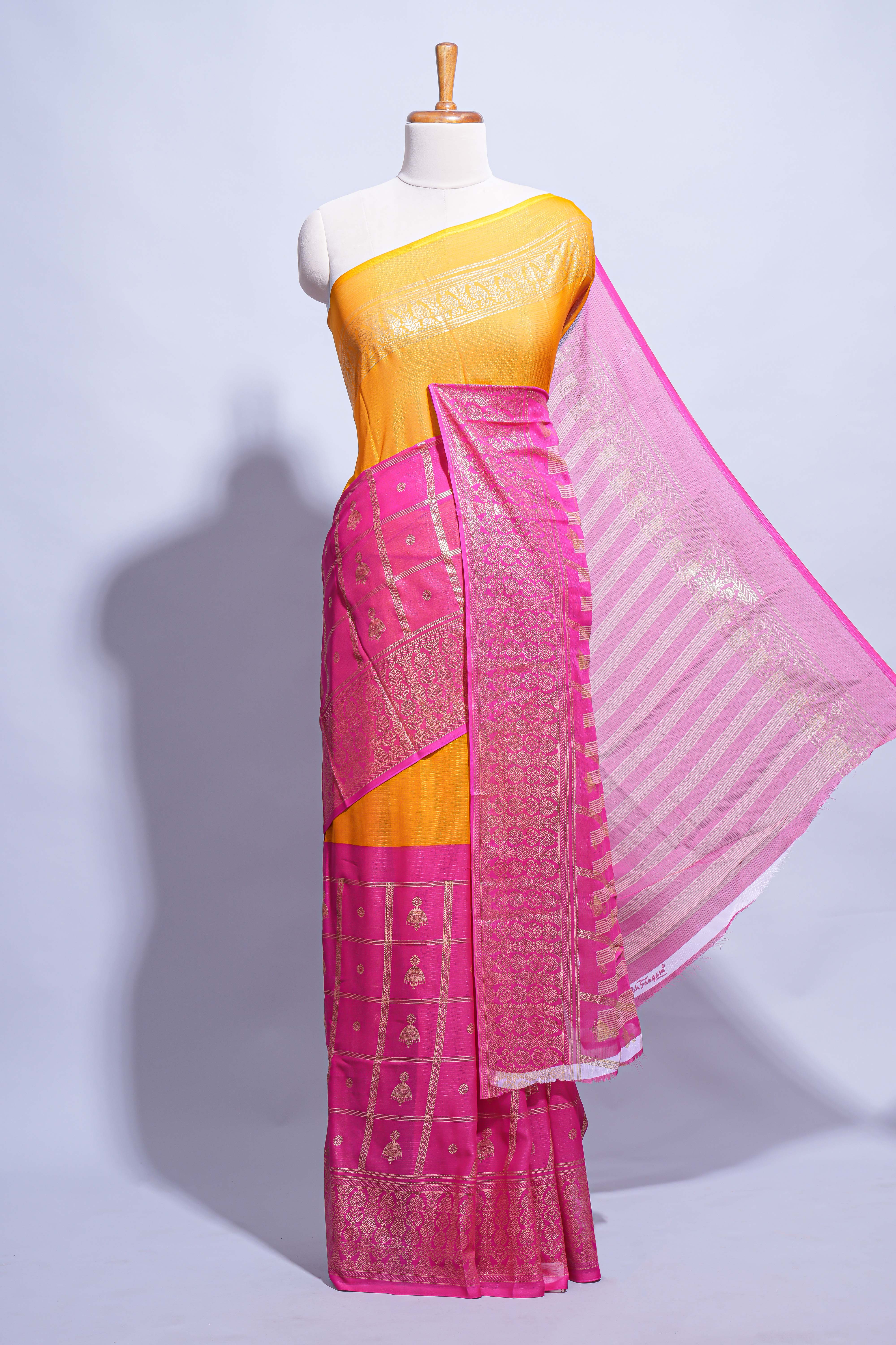 Yellow color budget silk saree with contrast foil print border and contrast pallu along with contrast blouse piece