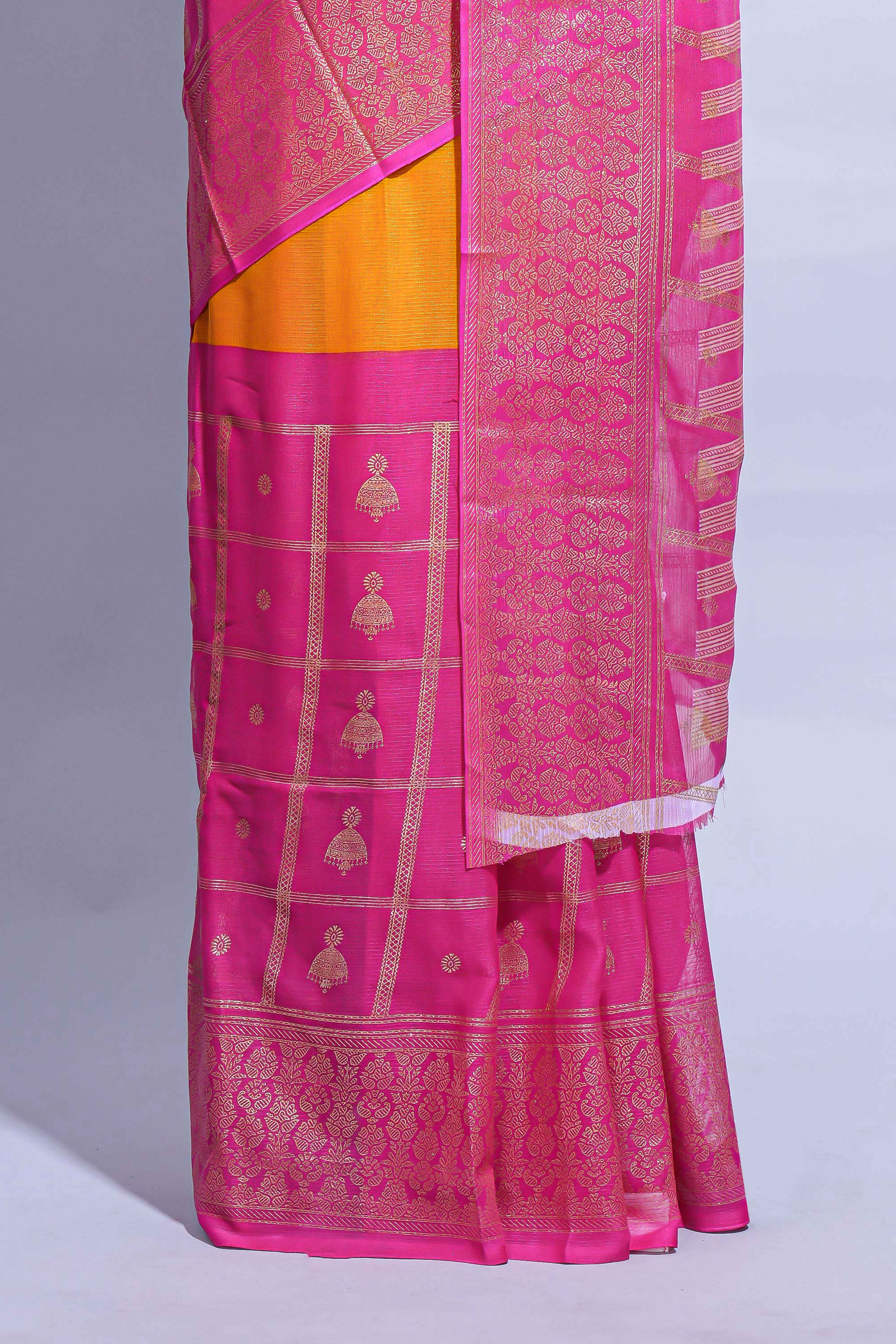 Yellow color budget silk saree with contrast foil print border and contrast pallu along with contrast blouse piece