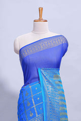 Royal blue color budget silk saree with contrast foil print border and contrast pallu along with contrast blouse piece