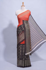 Rust Orange color budget silk saree with contrast foil print border and contrast pallu along with contrast blouse piece