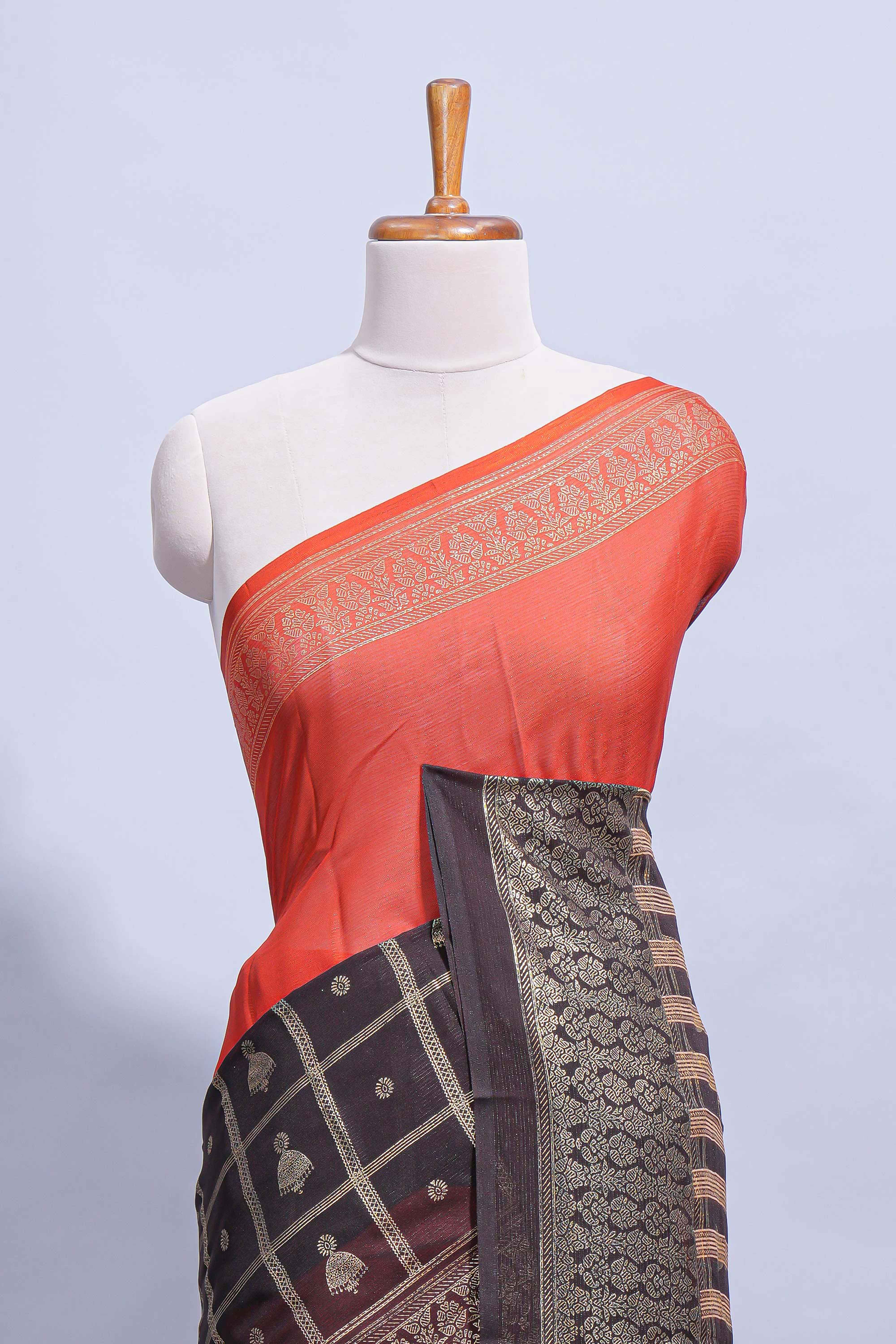 Rust Orange color budget silk saree with contrast foil print border and contrast pallu along with contrast blouse piece