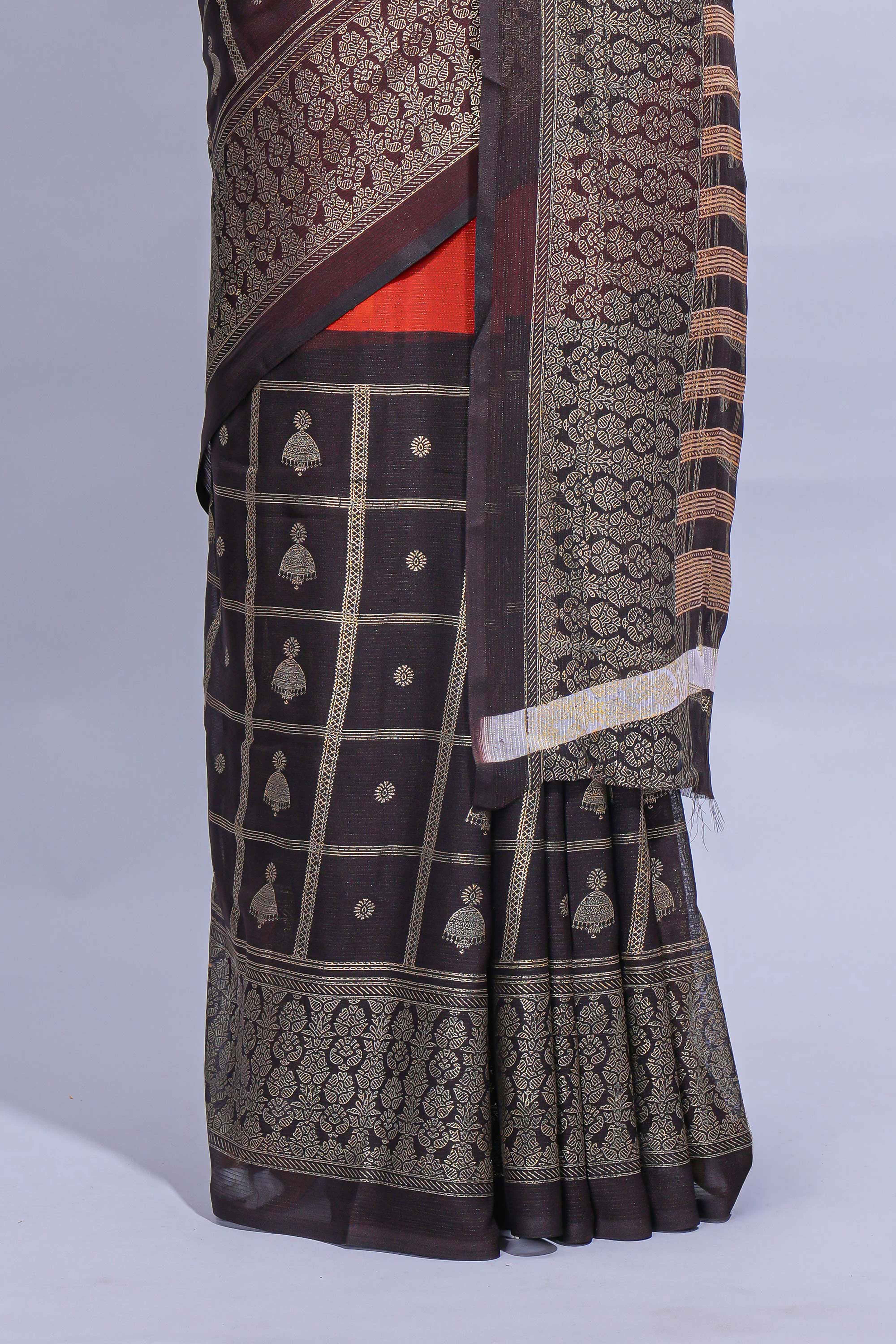 Rust Orange color budget silk saree with contrast foil print border and contrast pallu along with contrast blouse piece