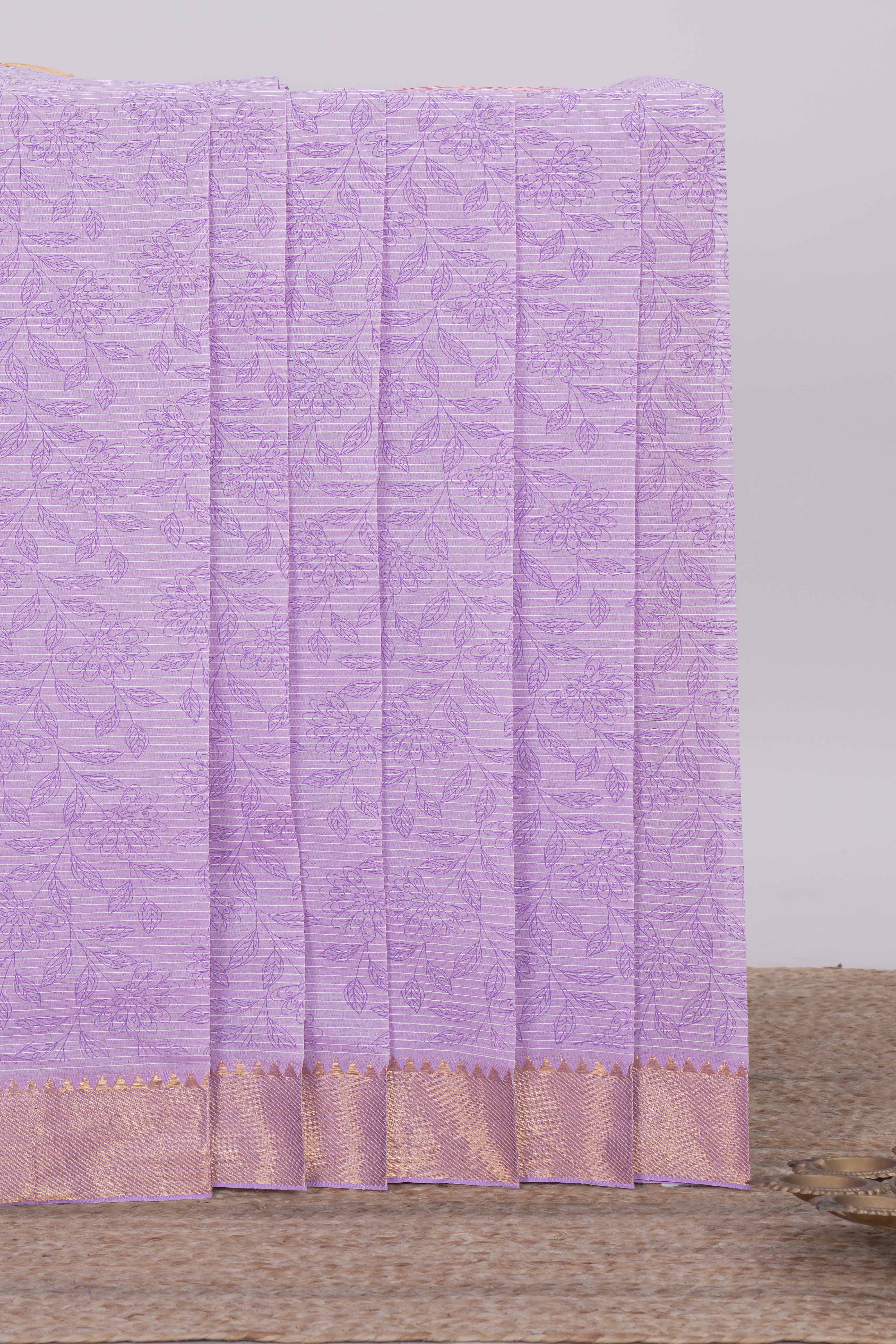 Lavender striped floral design chirala cotton saree with self zari border and matching blouse