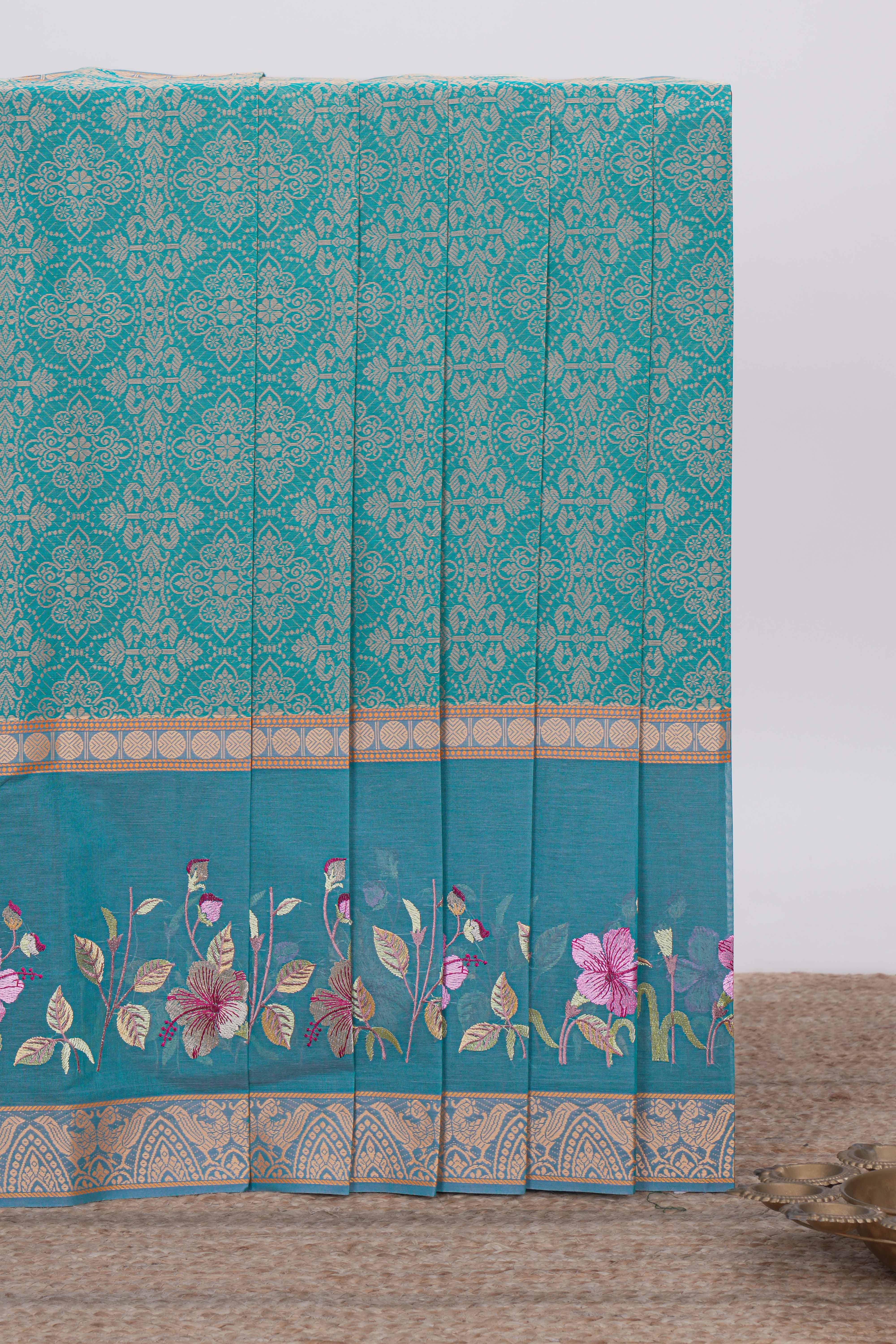 Green floral design chirala cotton saree with contrast border and matching blouse