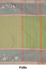 Olive green floral design chirala cotton saree with contrast border and matching blouse