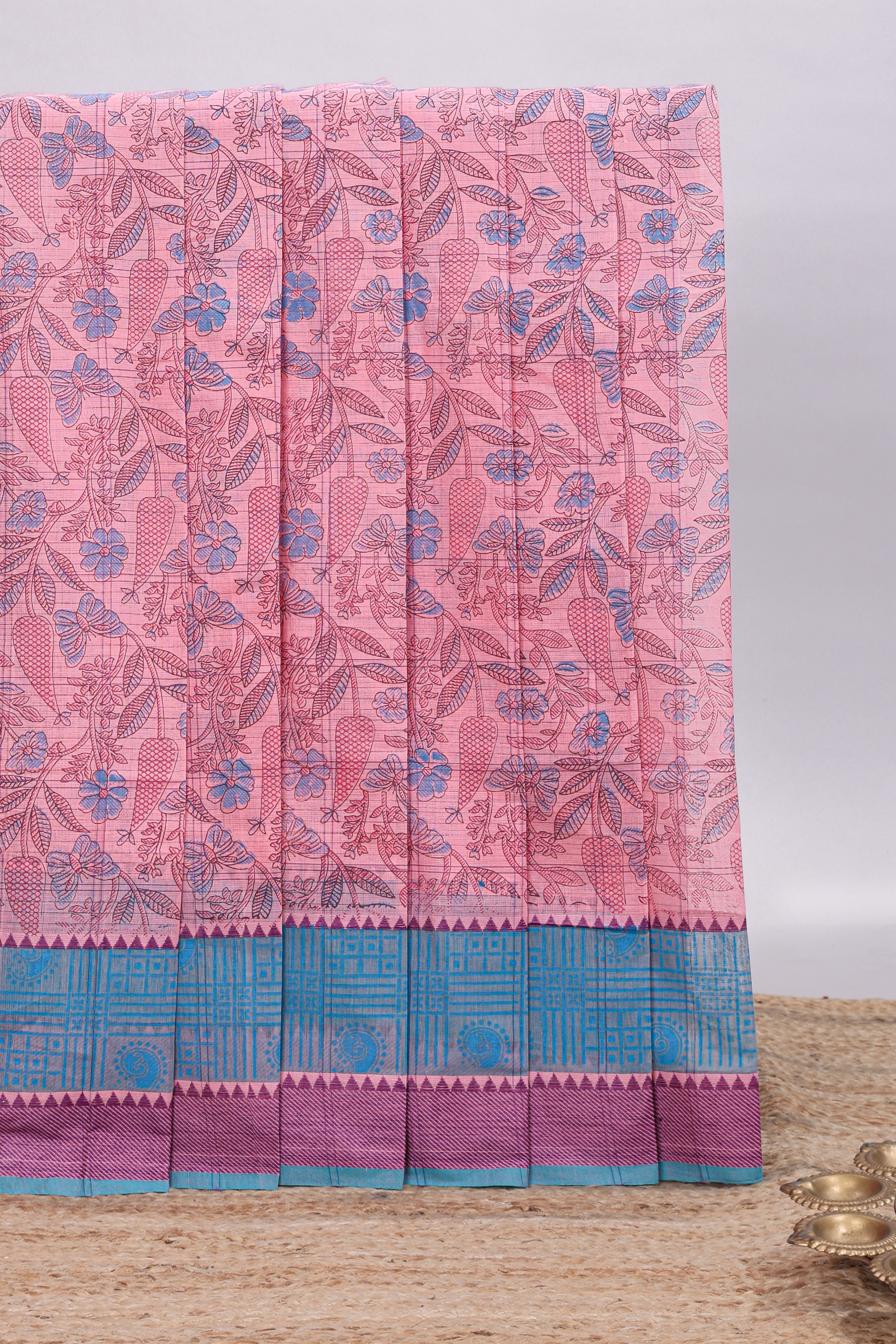 Pink checked floral design chirala cotton saree with contrast border and striped blouse