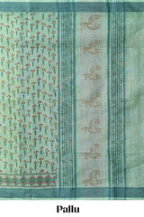 Green checked floral design chirala cotton saree with self border and printed blouse