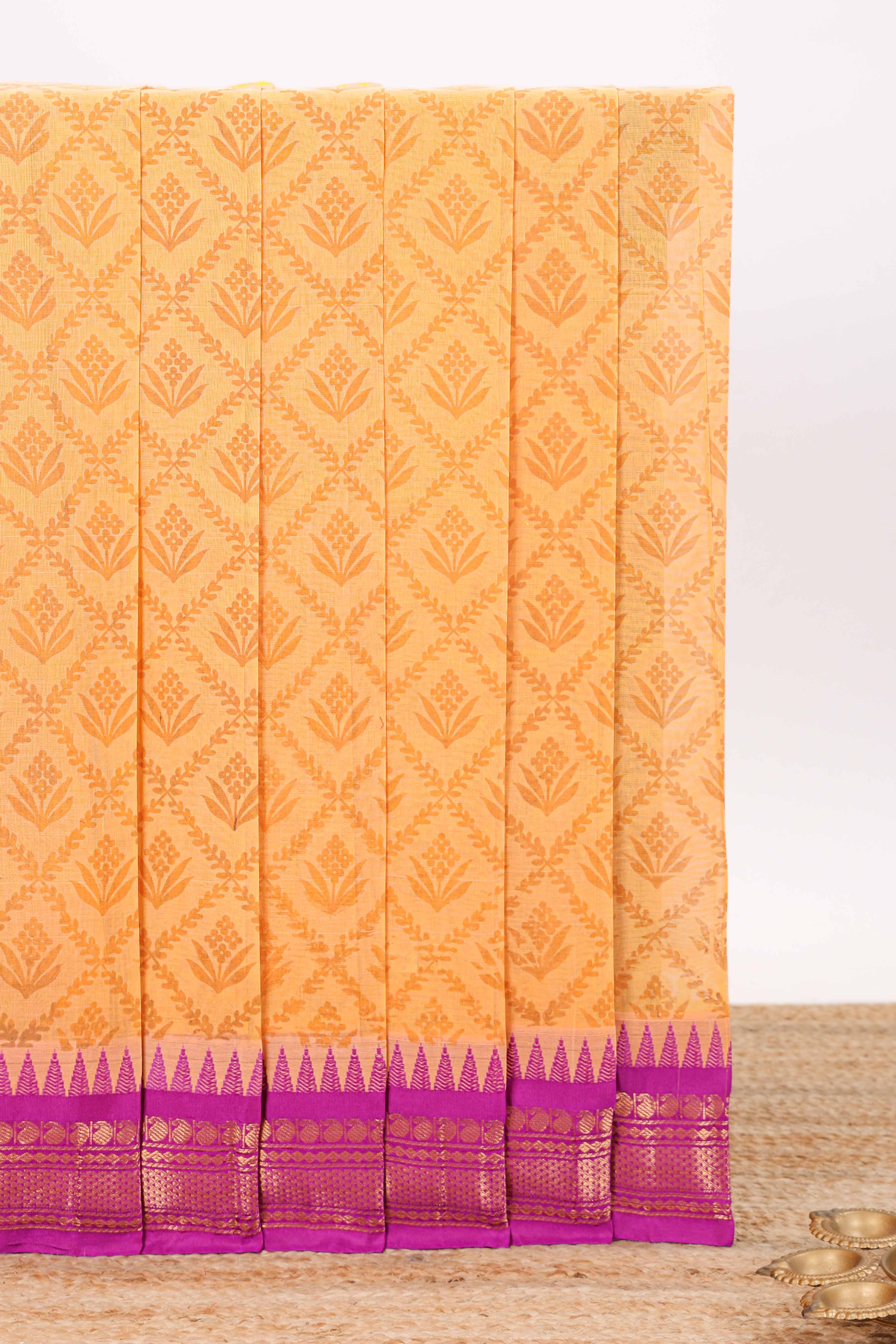 Mango yellow geometric floral design chirala cotton saree with contrast border and zari design pallu