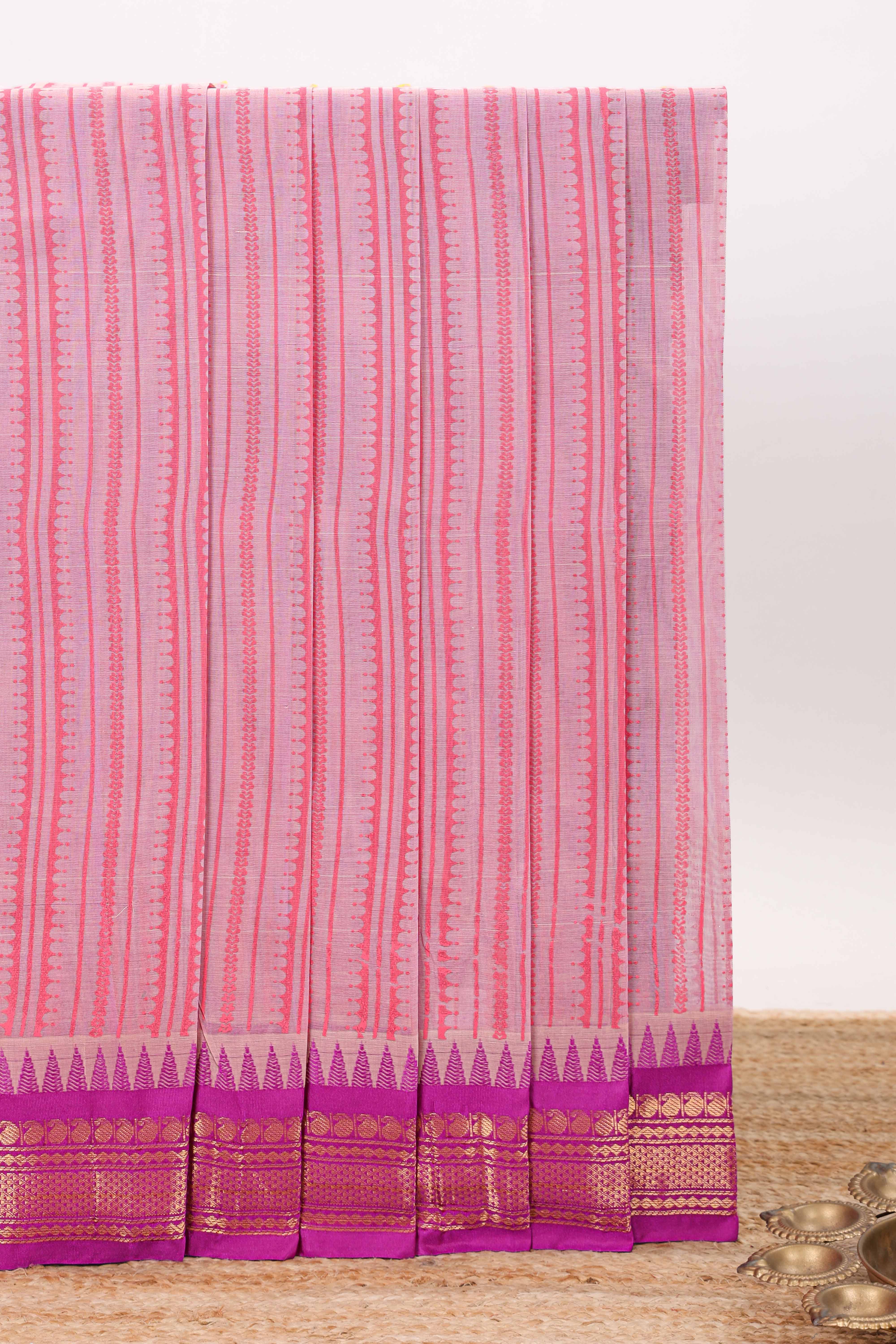 Pink striped chirala cotton saree with contrast zari border and pallu