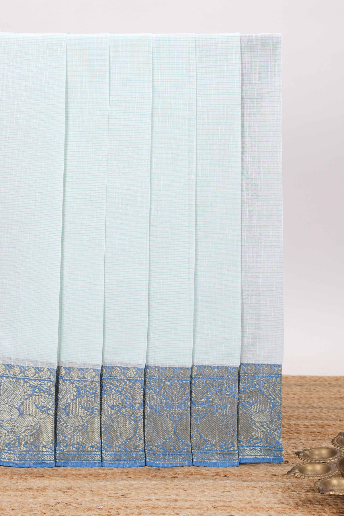 Soft powder blue plain chirala cotton saree with contrast zari border and blouse