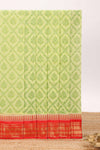 Green geometric floral design chirala cotton saree with contrast border and zari design pallu