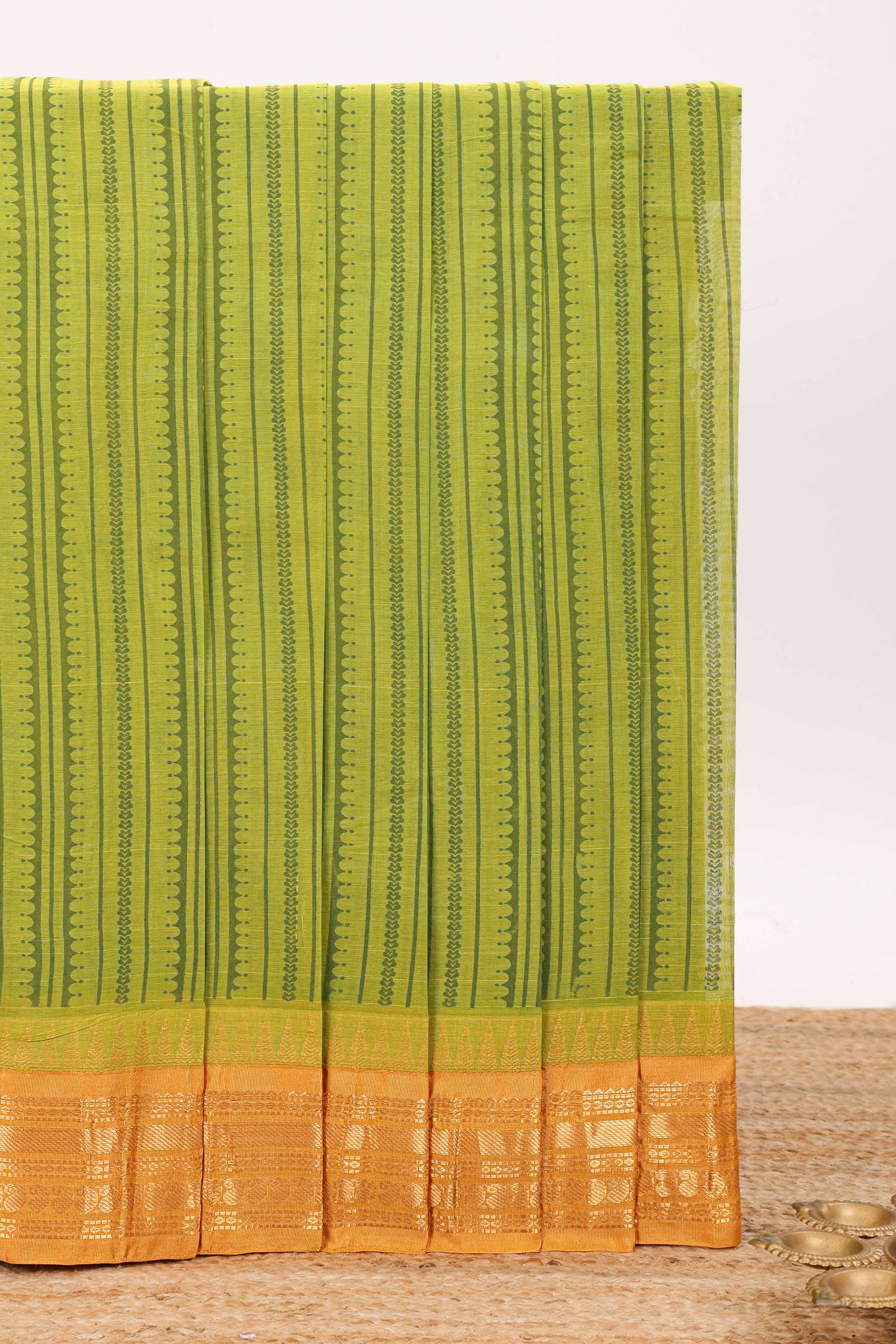 Green striped unique design chirala cotton saree with contrast border and zari design pallu