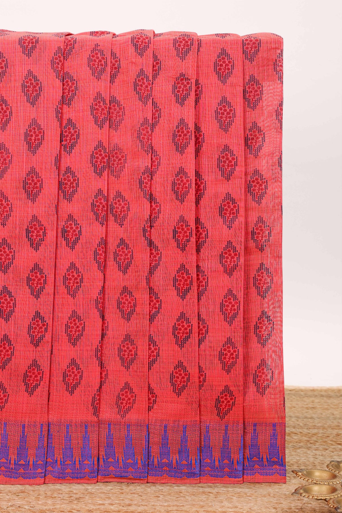 Coral red butta designed chirala cotton saree with self border and contrast blouse