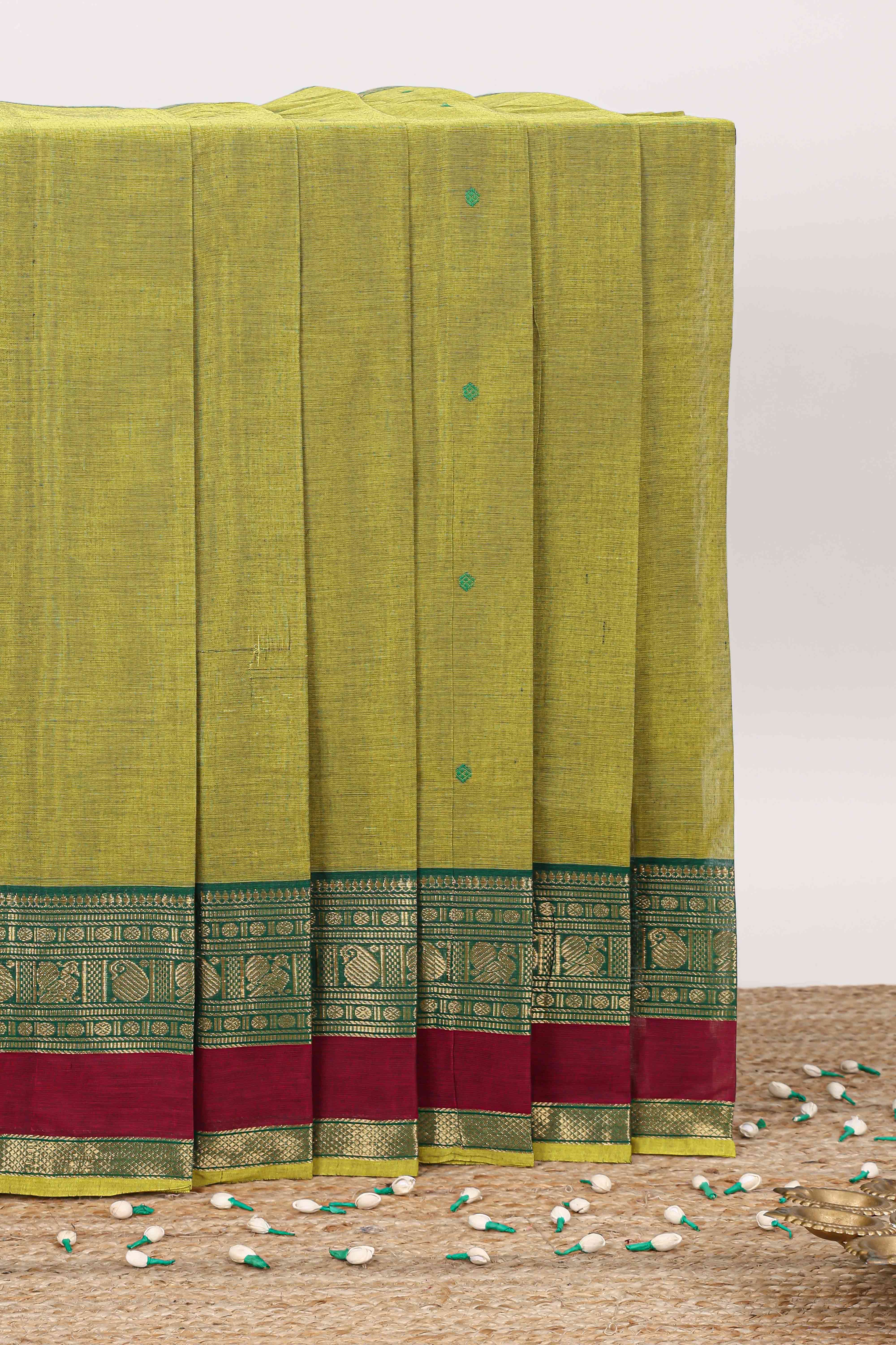 Green butta chettinad cotton saree with contrast zari border and stripe pallu