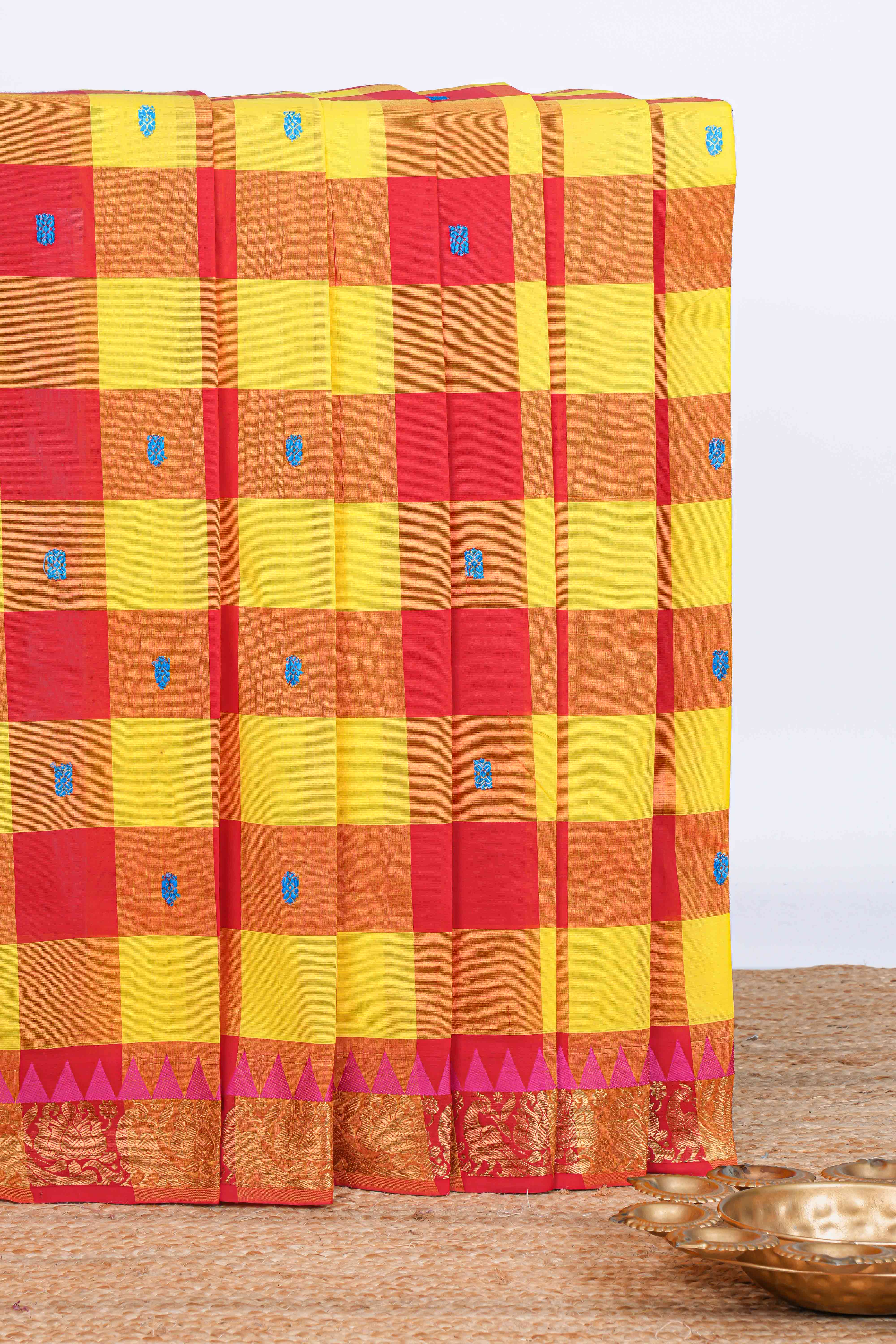 Red and yellow checked floral motifs chettinad cotton saree with self zari border and matching pallu