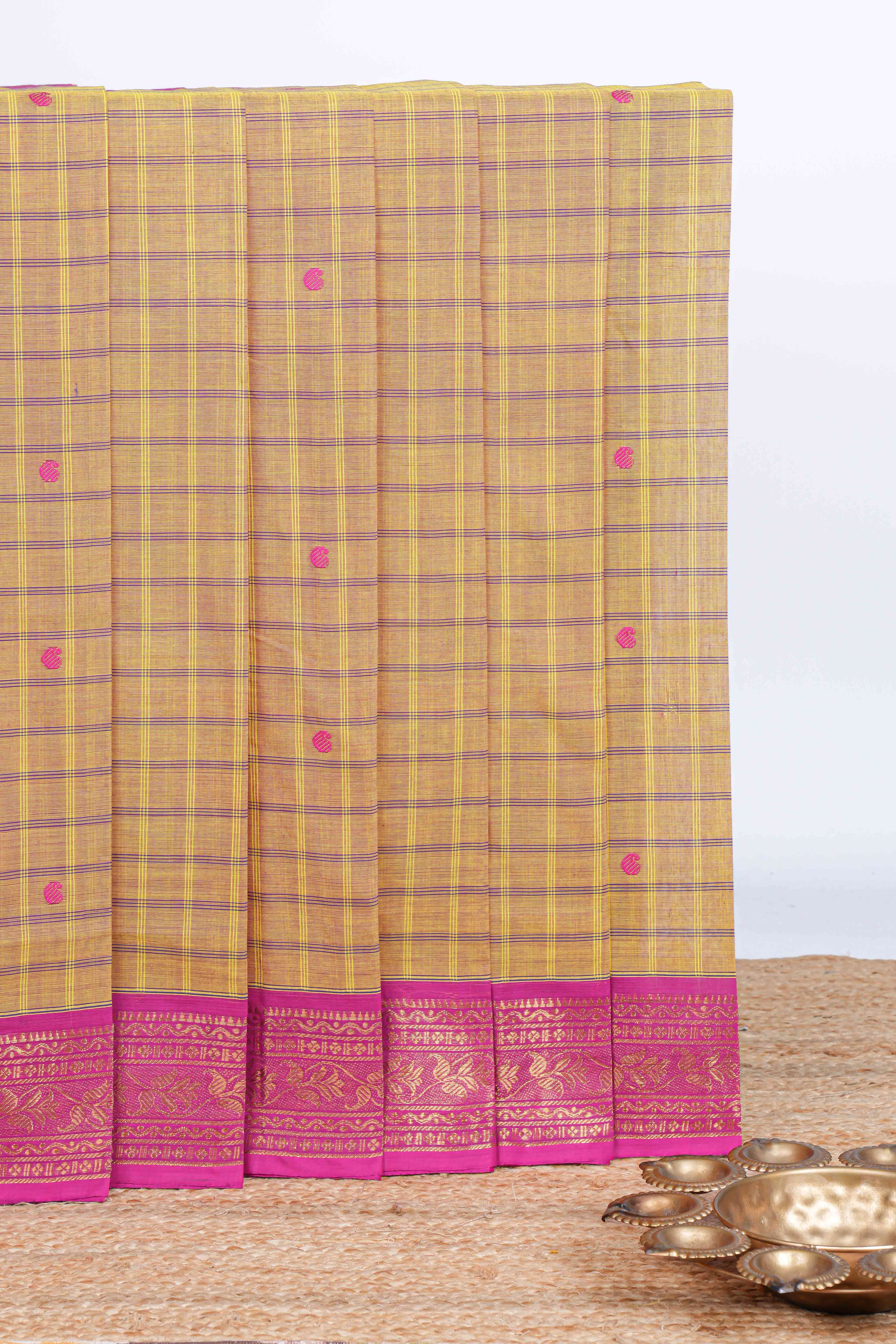 Mustard checked thread motifs chettinad cotton saree with contrast zari border and matching blouse
