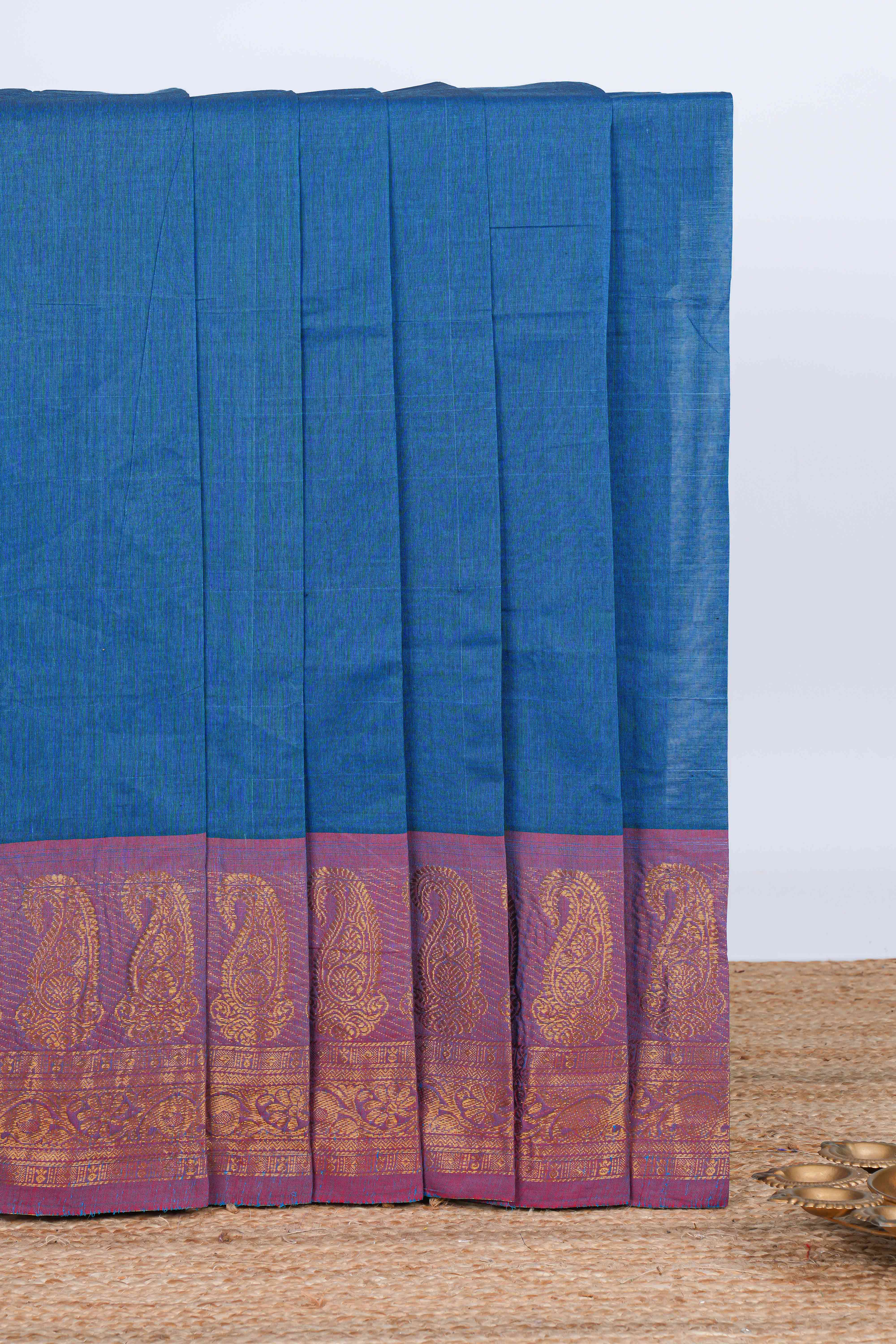Blue plain chettinad cotton saree with contrast zari border and matching blouse