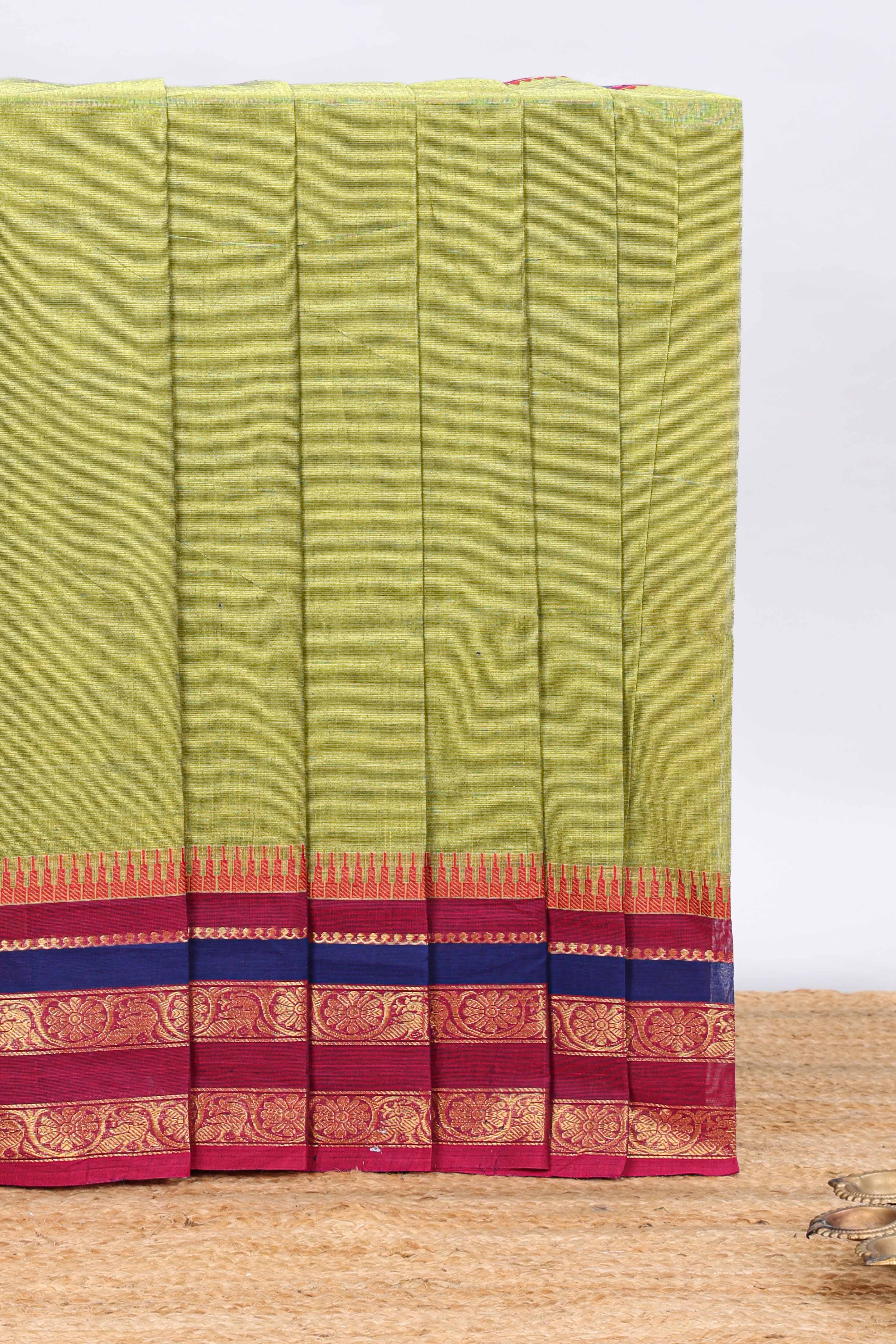 Green striped chettinad cotton saree with contrast zari border and matching blouse