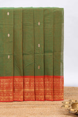 Olive green butta chettinad cotton saree with contrast zari border and matching blouse