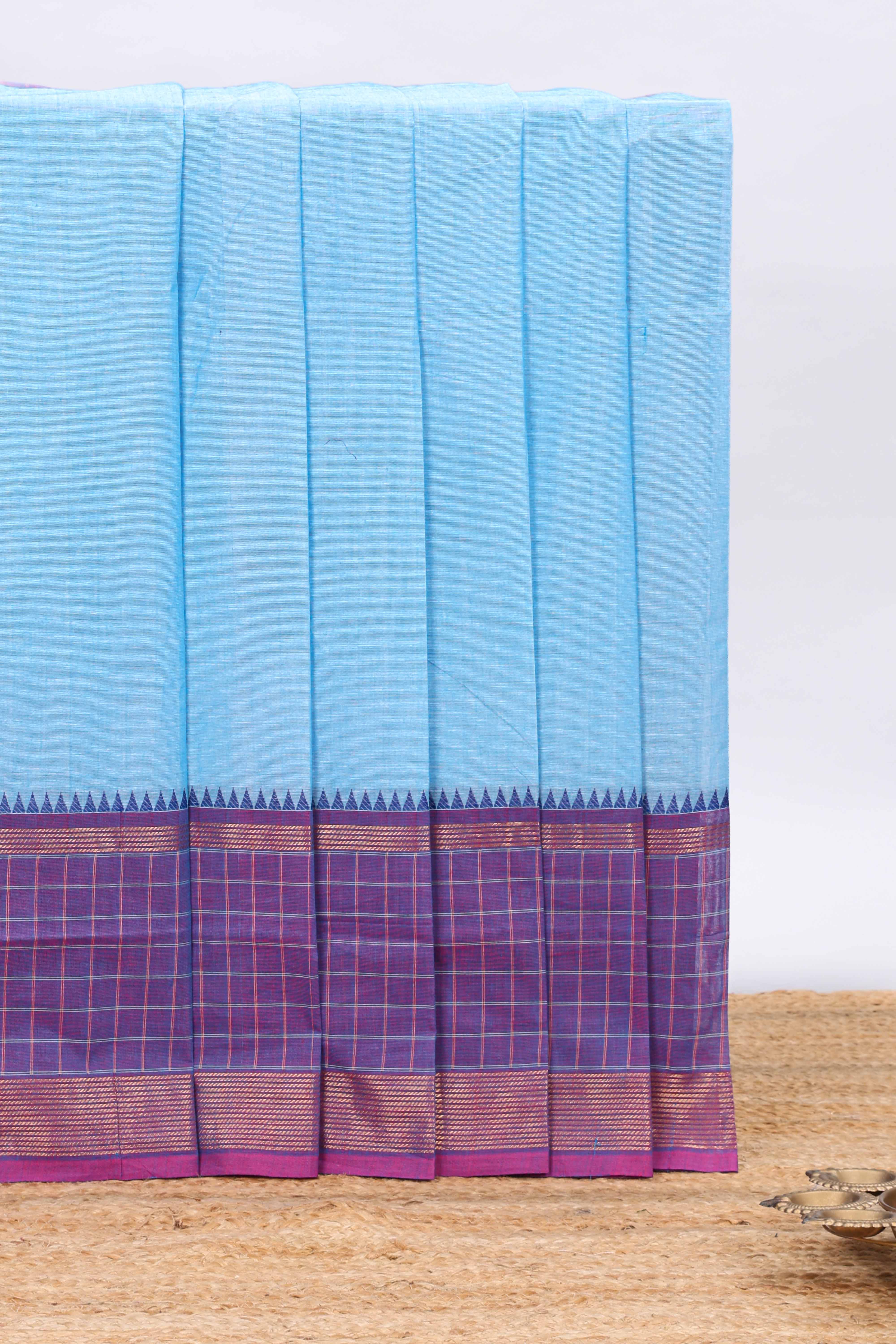 Blue plain chettinad cotton saree with contrast checked border and matching blouse