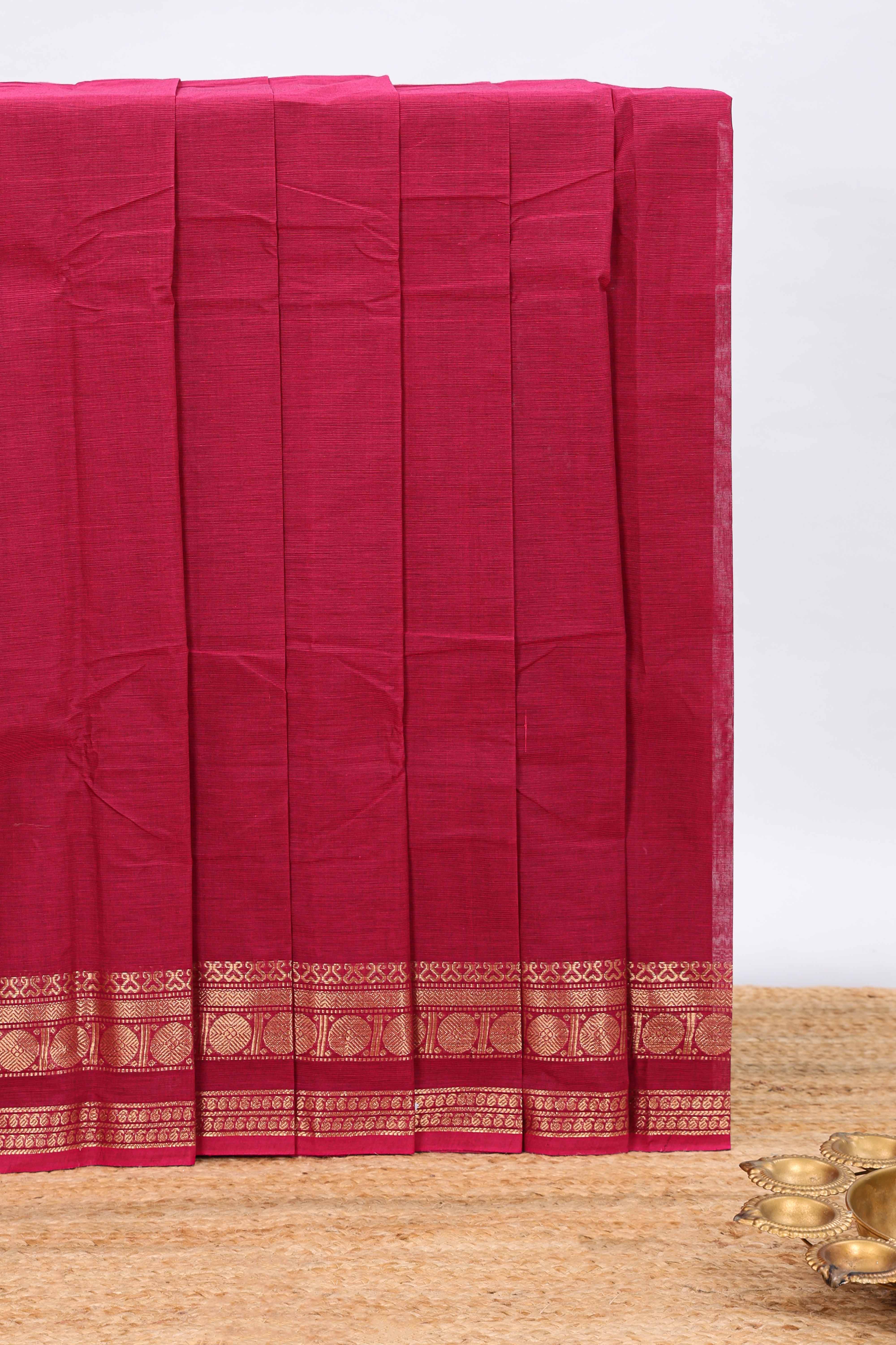 Maroon plain chettinad cotton saree with self zari border and matching blouse
