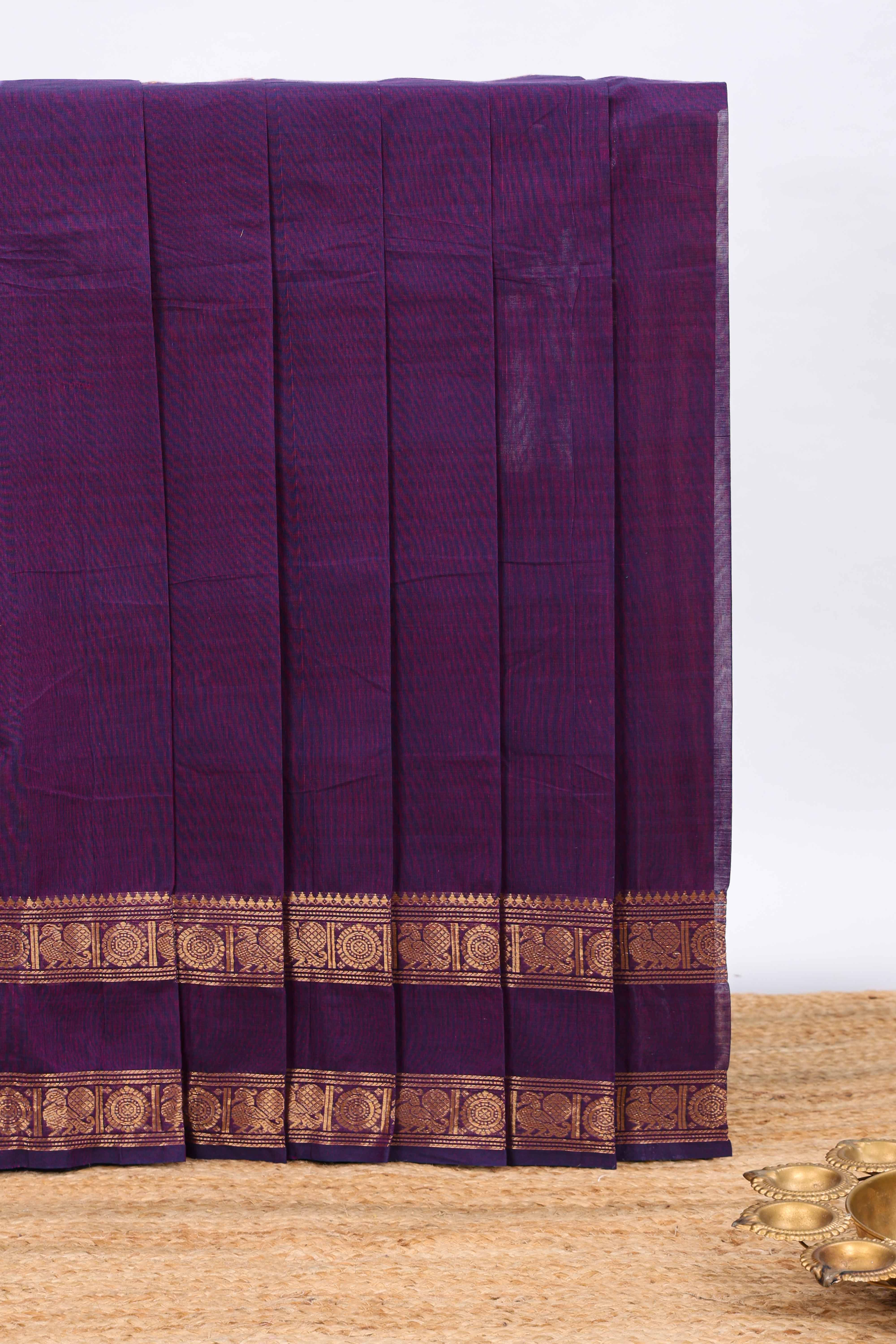 Plum purple plain chettinad cotton saree with contrast zari border and matching blouse