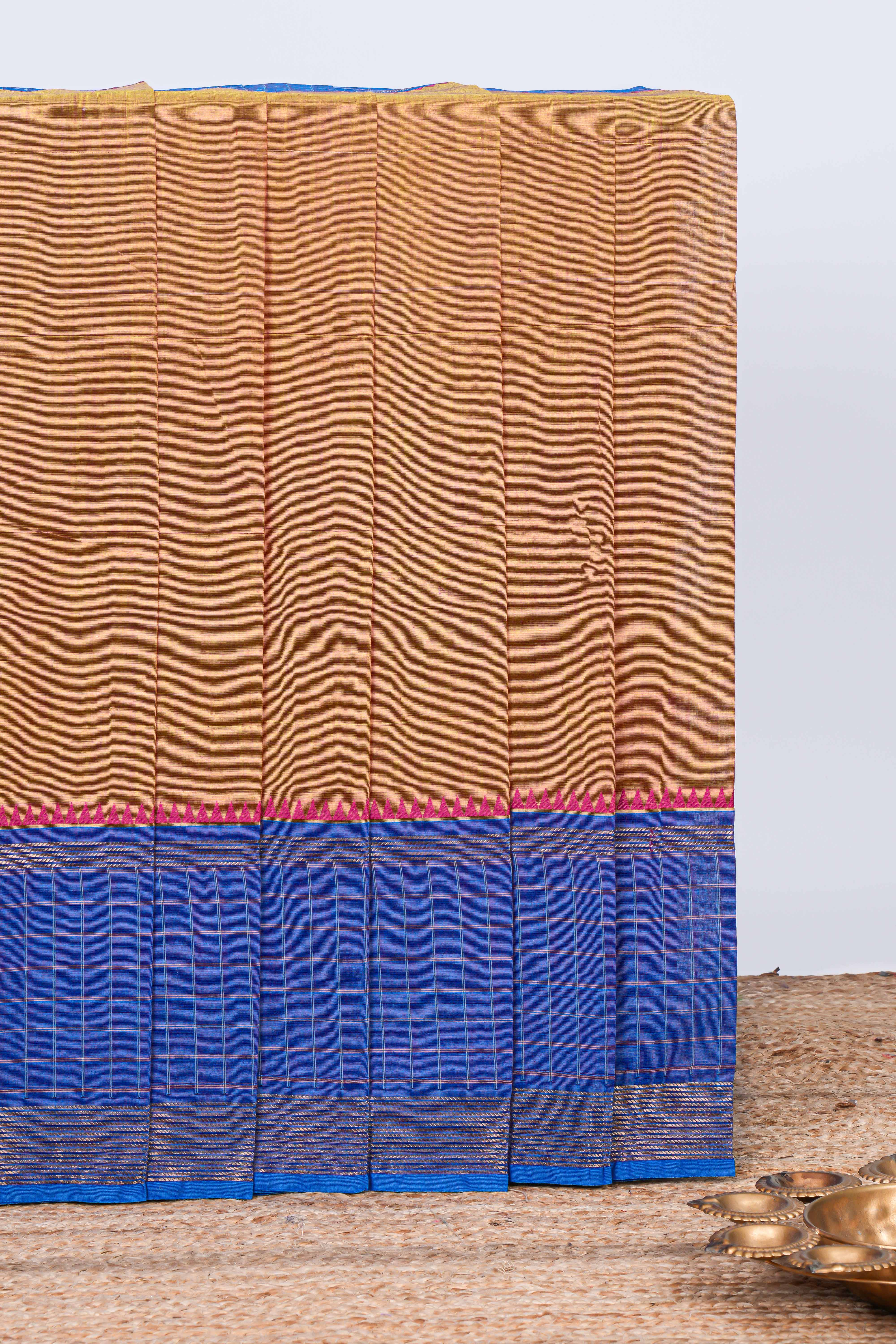 Brown plain chettinad cotton saree with contrast checked border and matching striped pallu