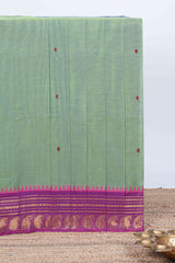 Emerald green thread butta chettinad cotton saree with contrast border and matching striped pallu