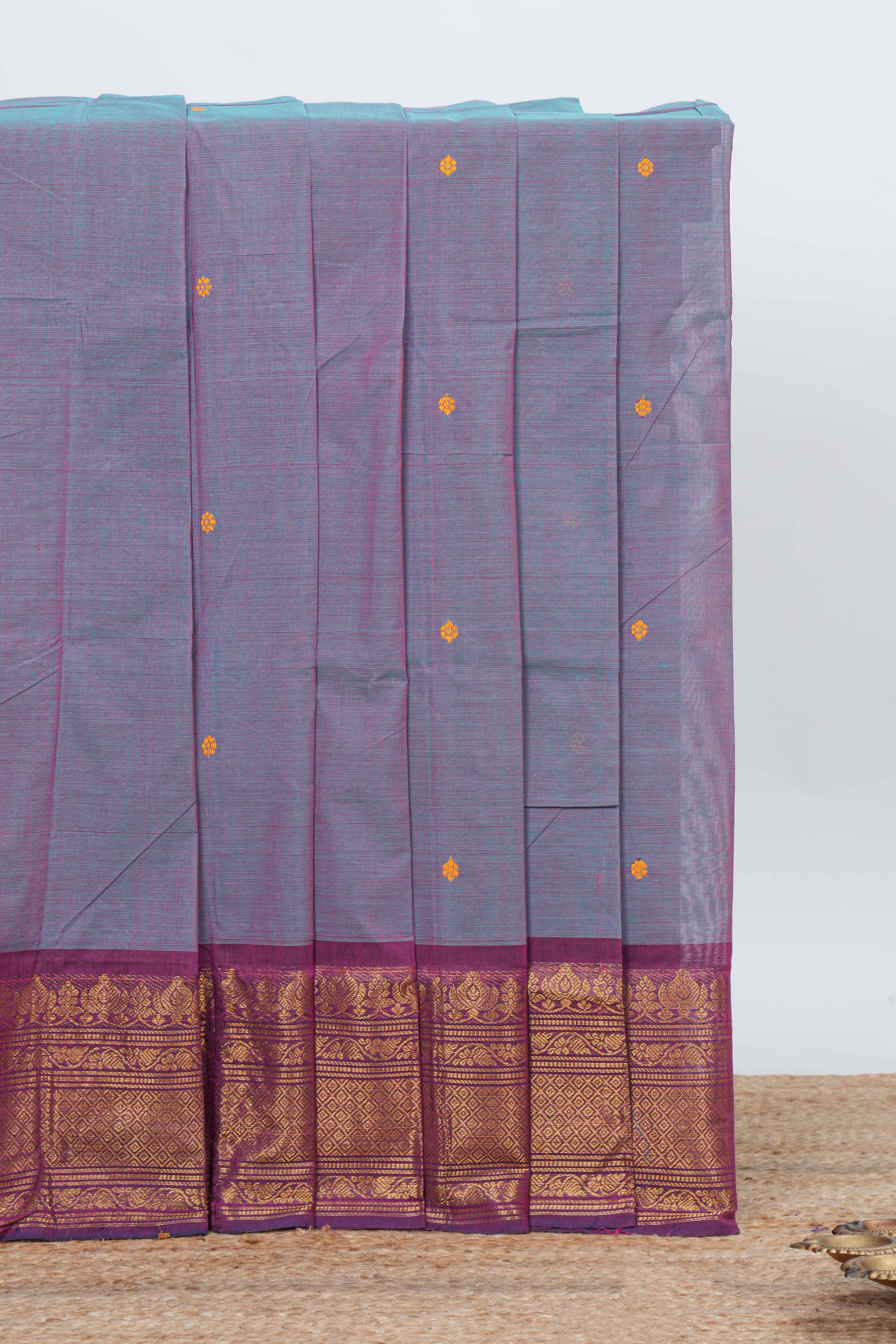 Lavender colour chettinad cotton saree all over thread butta with contrast border and self pallu along with blouse piece