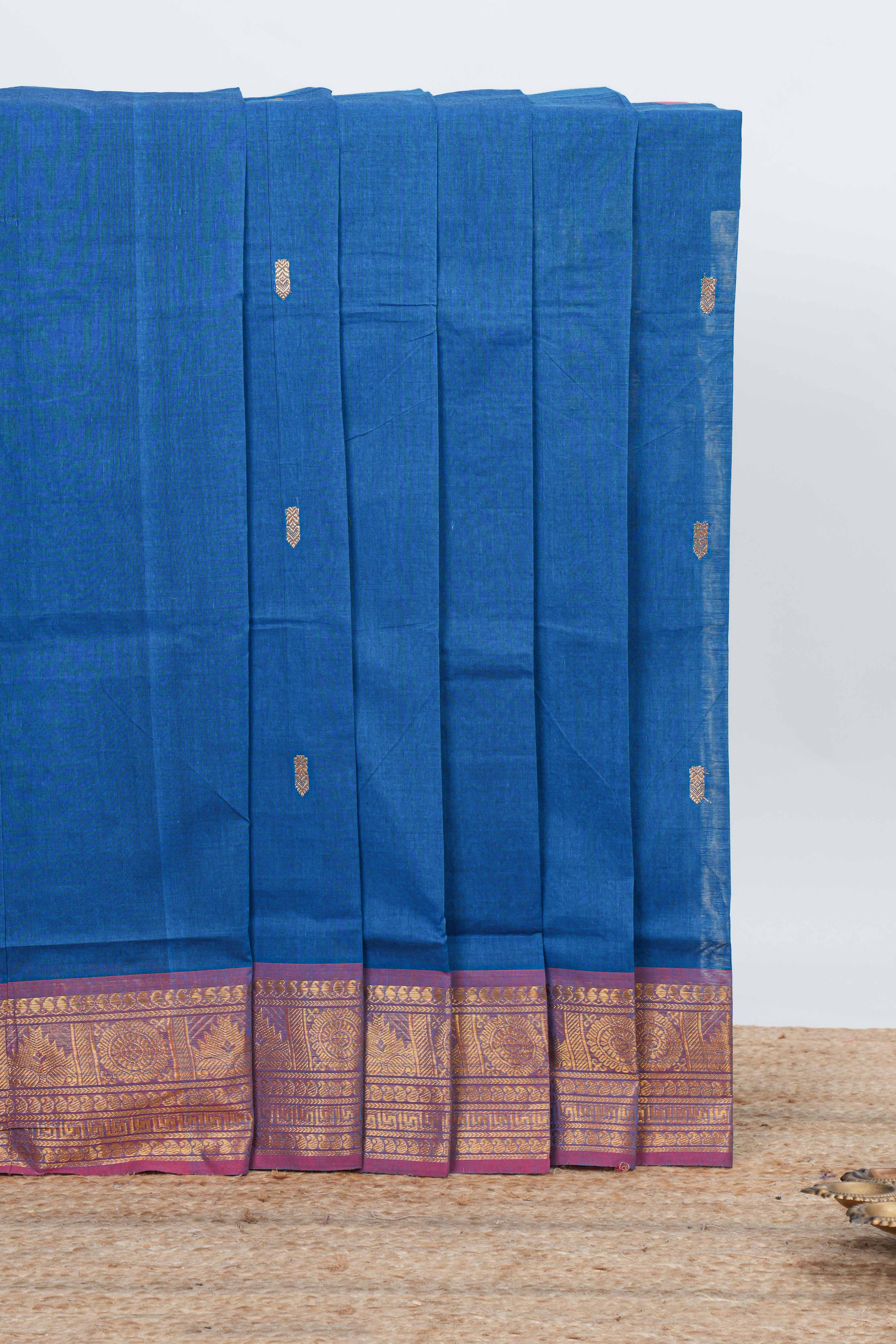 Royal blue colour chettinad cotton saree all over thread butta with contrast border and zari pallu along with blouse piece