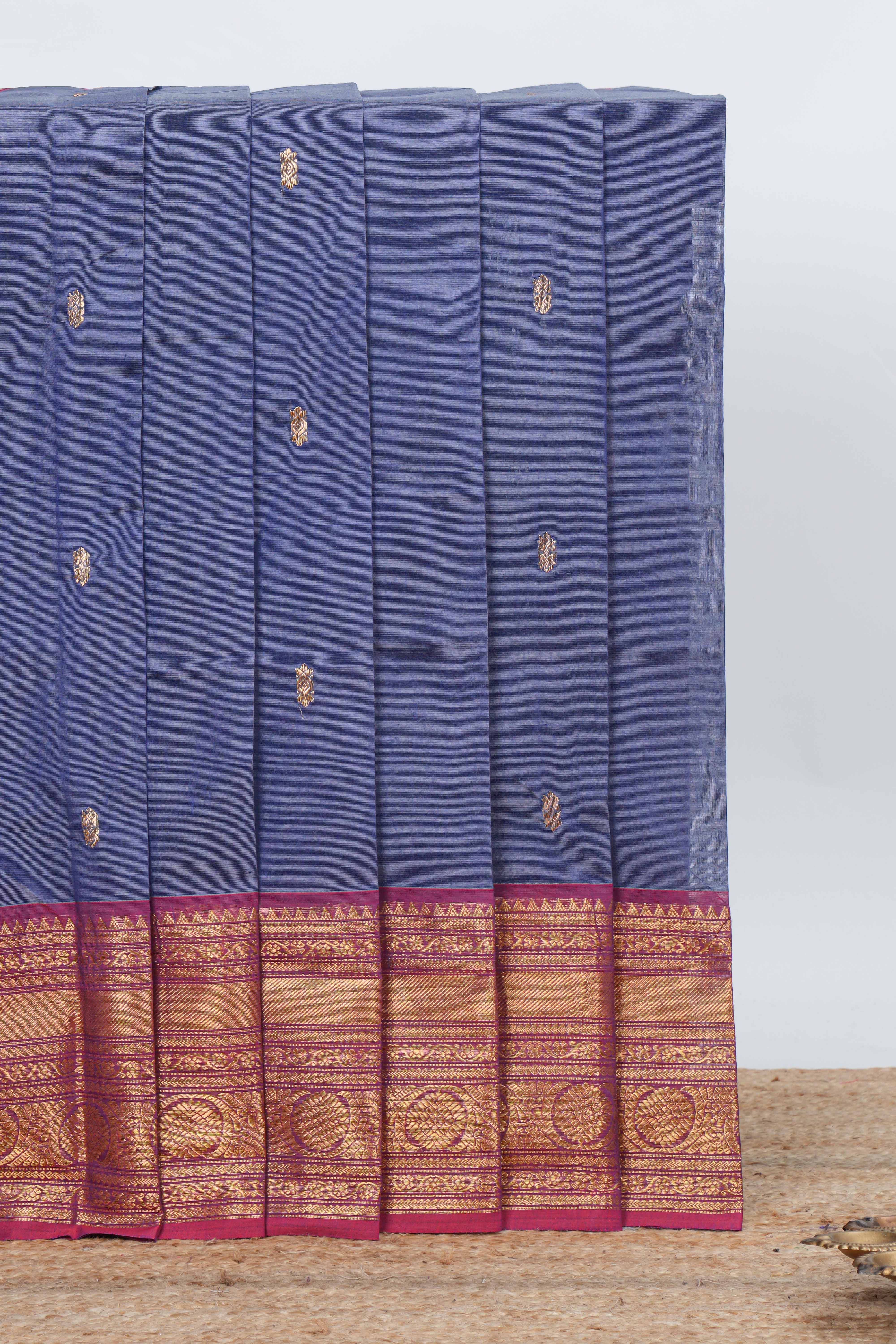 Blue colour chettinad cotton saree all over thread butta with contrast border and zari pallu along with blouse piece