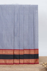 Grey colour chettinad cotton saree plain body with contrast border and self pallu along with blouse piece
