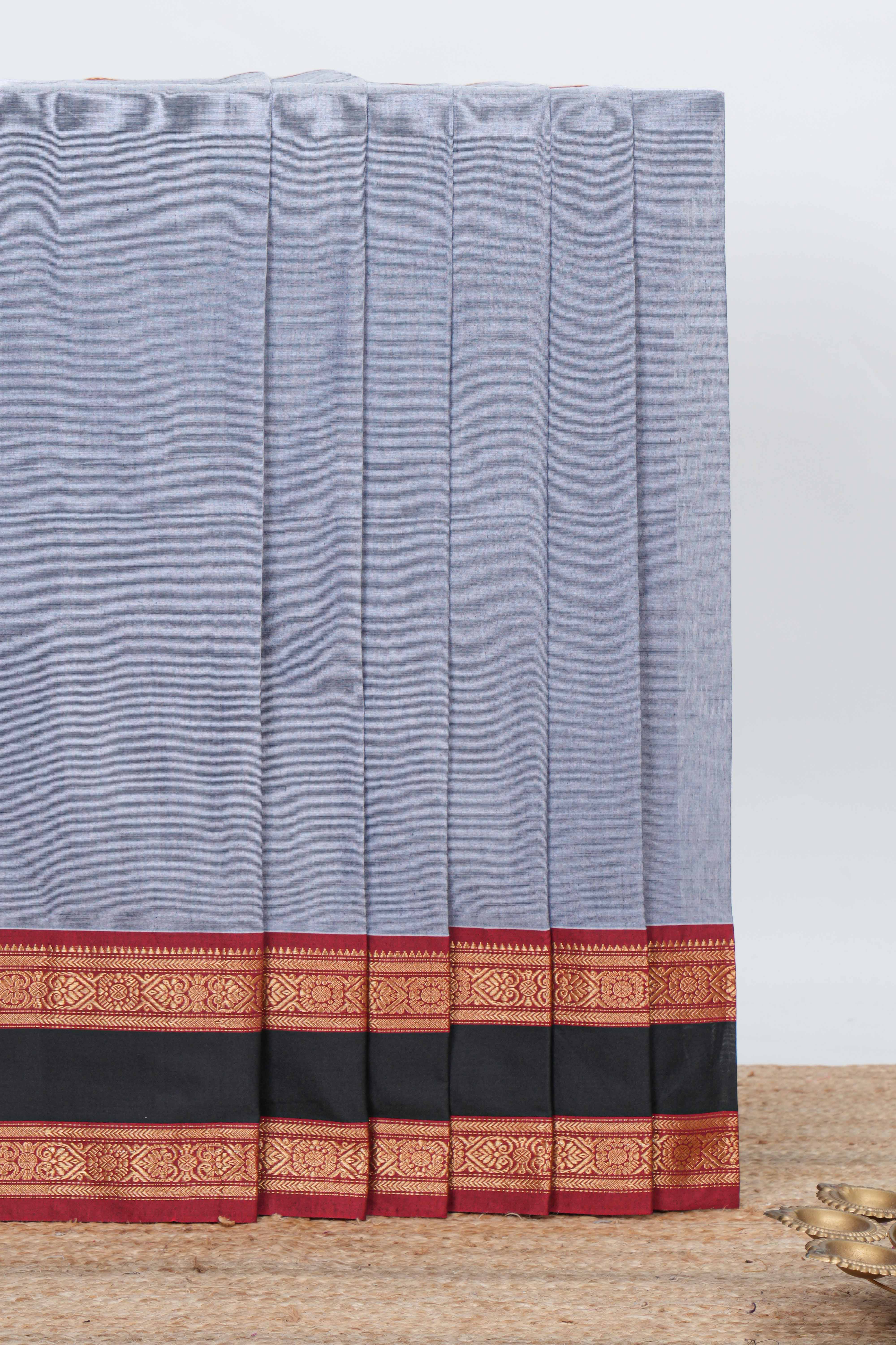 Grey colour chettinad cotton saree plain body with contrast border and self pallu along with blouse piece