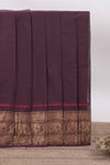 Deep coffee brown Chettinad cotton saree with a plain body antique gold zari elephant border along with matching blouse
