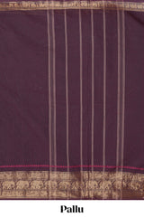 Deep coffee brown Chettinad cotton saree with a plain body antique gold zari elephant border along with matching blouse