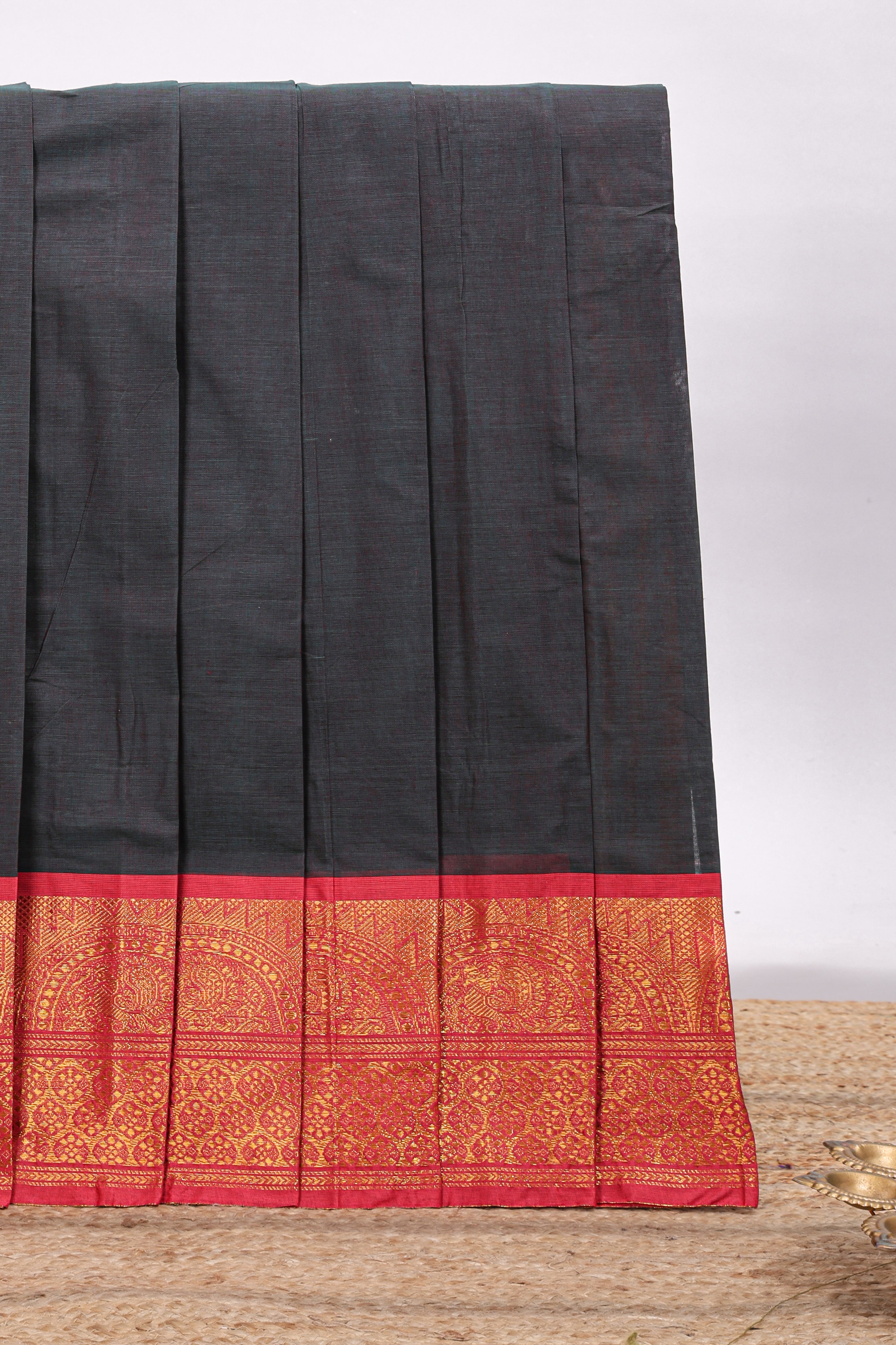 Black plain chettinad cotton saree with contrast zari border and matching blouse