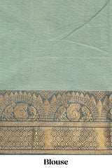 Teal green plain chettinad cotton saree with contrast zari border and matching blouse