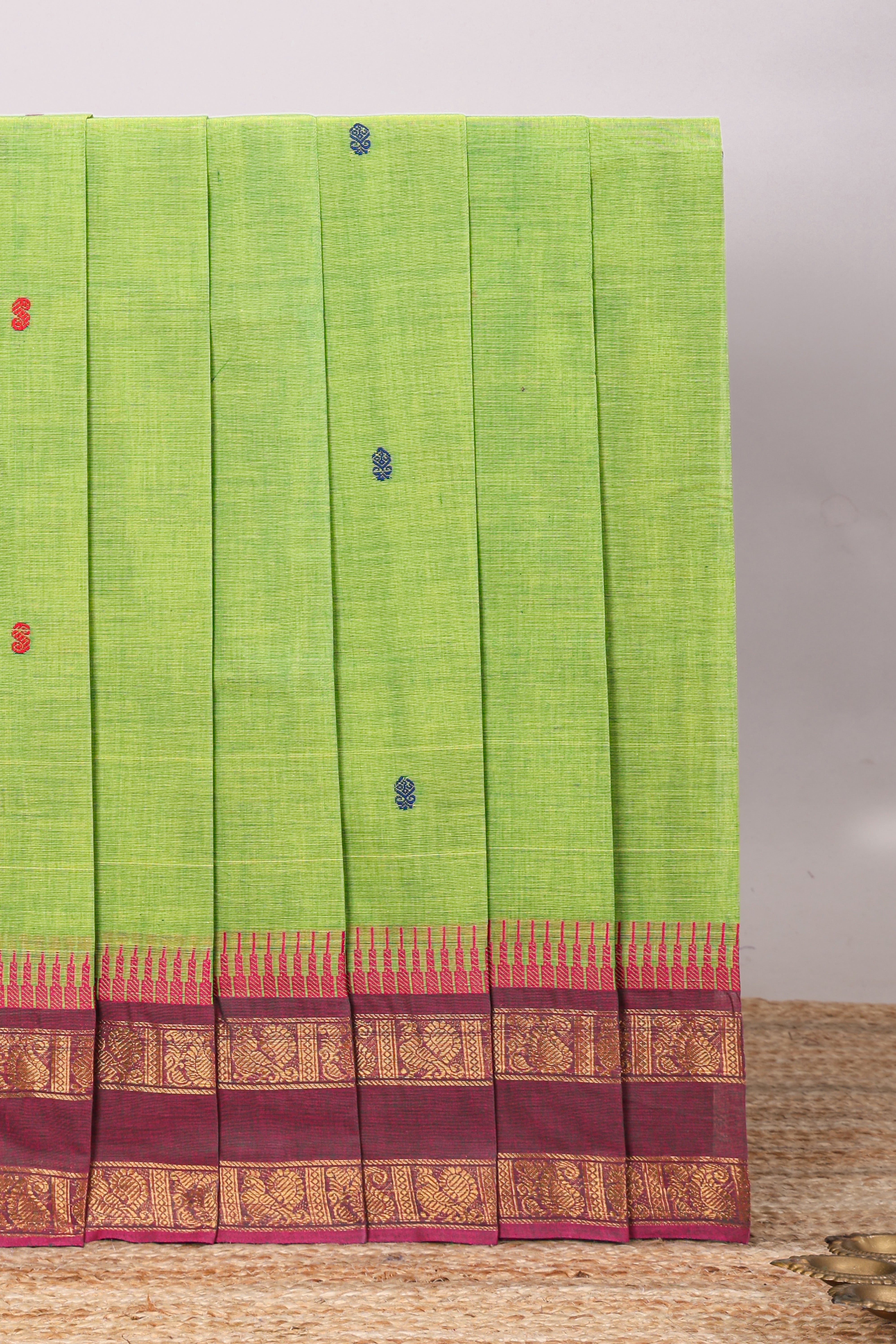 Green motifs design chettinad cotton saree with contrast zari border and matching blouse