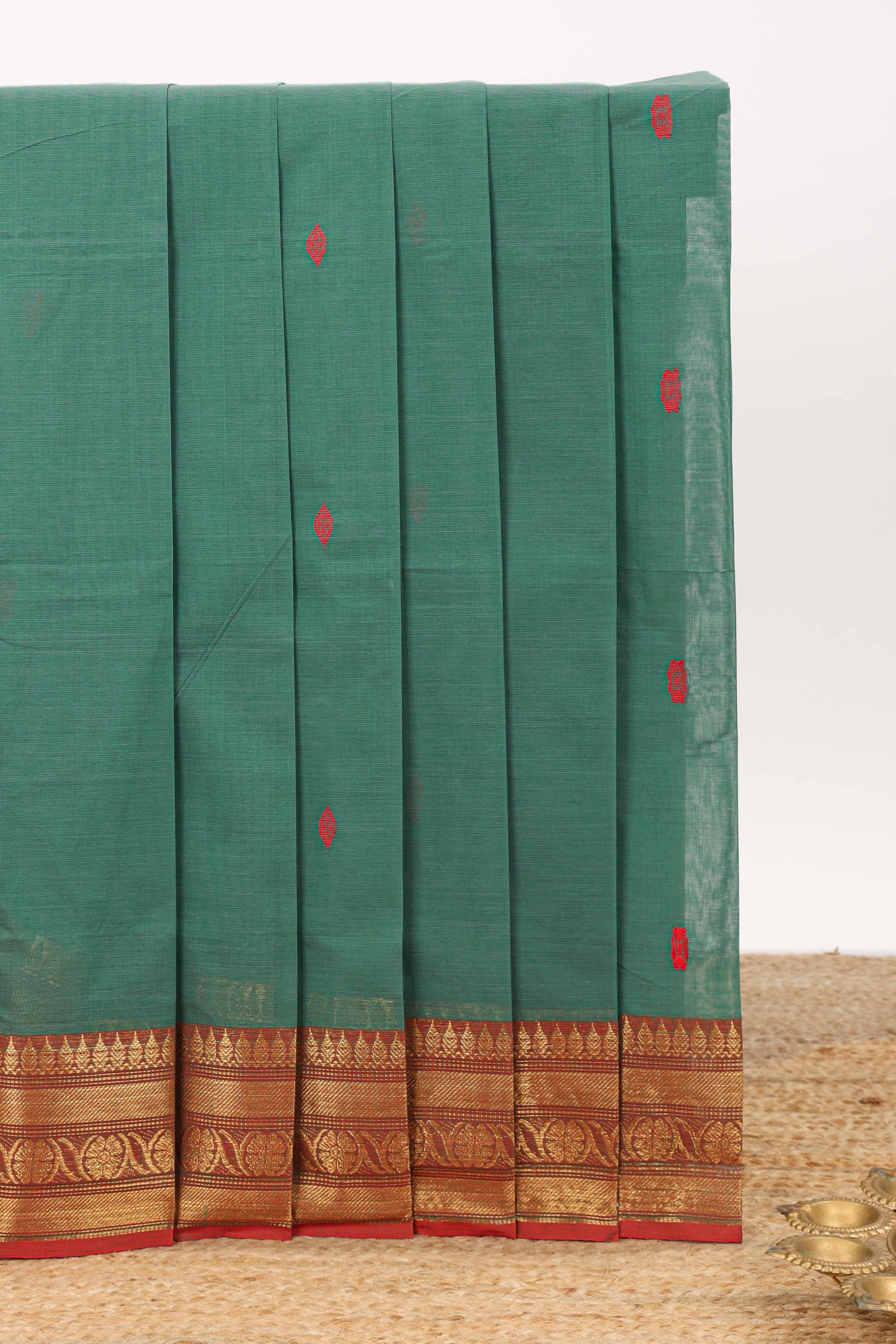 Sea green motifs design chettinad cotton saree with contrast zari border and matching blouse