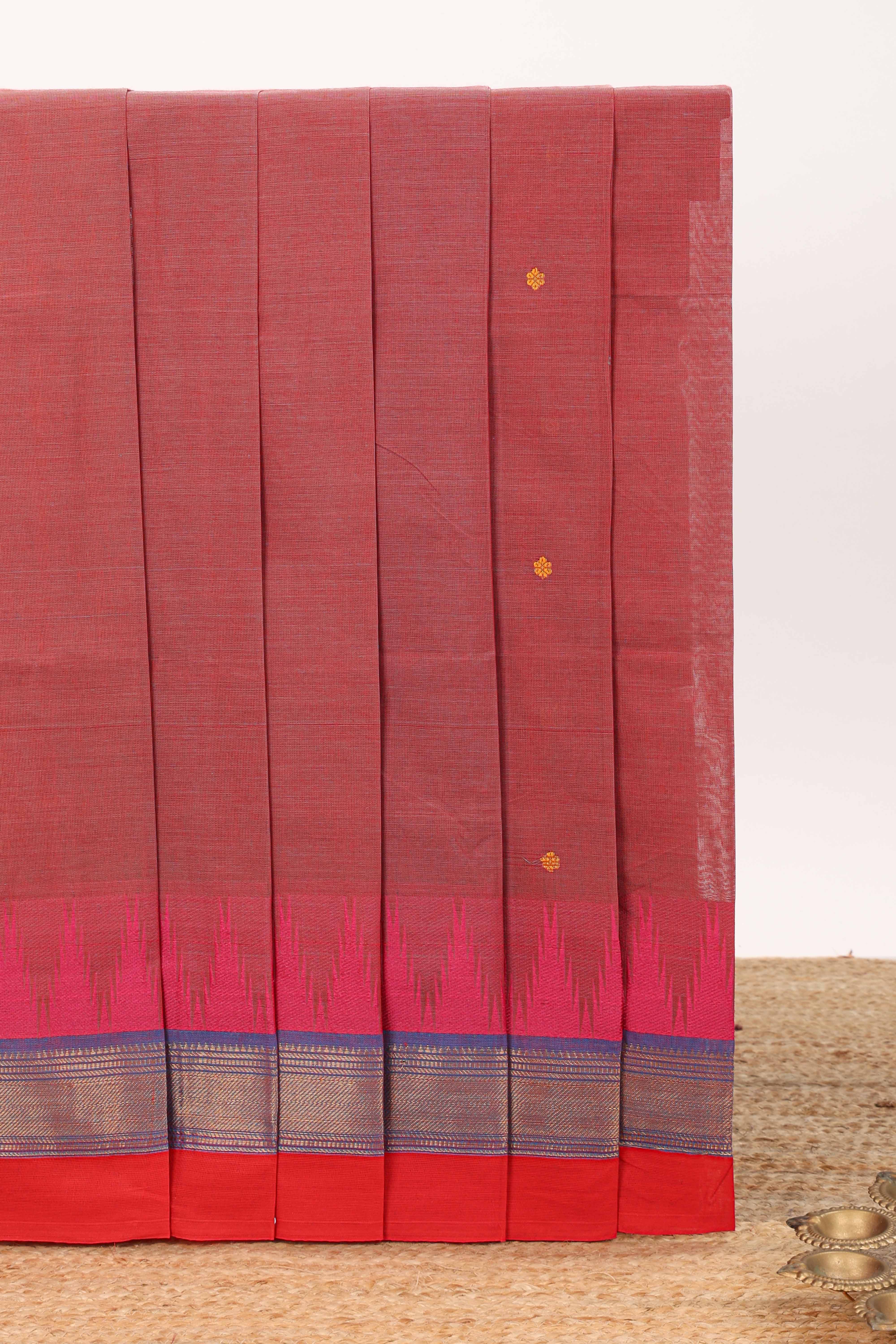 Brick red motifs design chettinad cotton saree with contrast zari border and matching blouse
