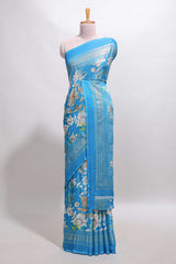 Sky blue floral design chiffon saree with self border and matching blouse