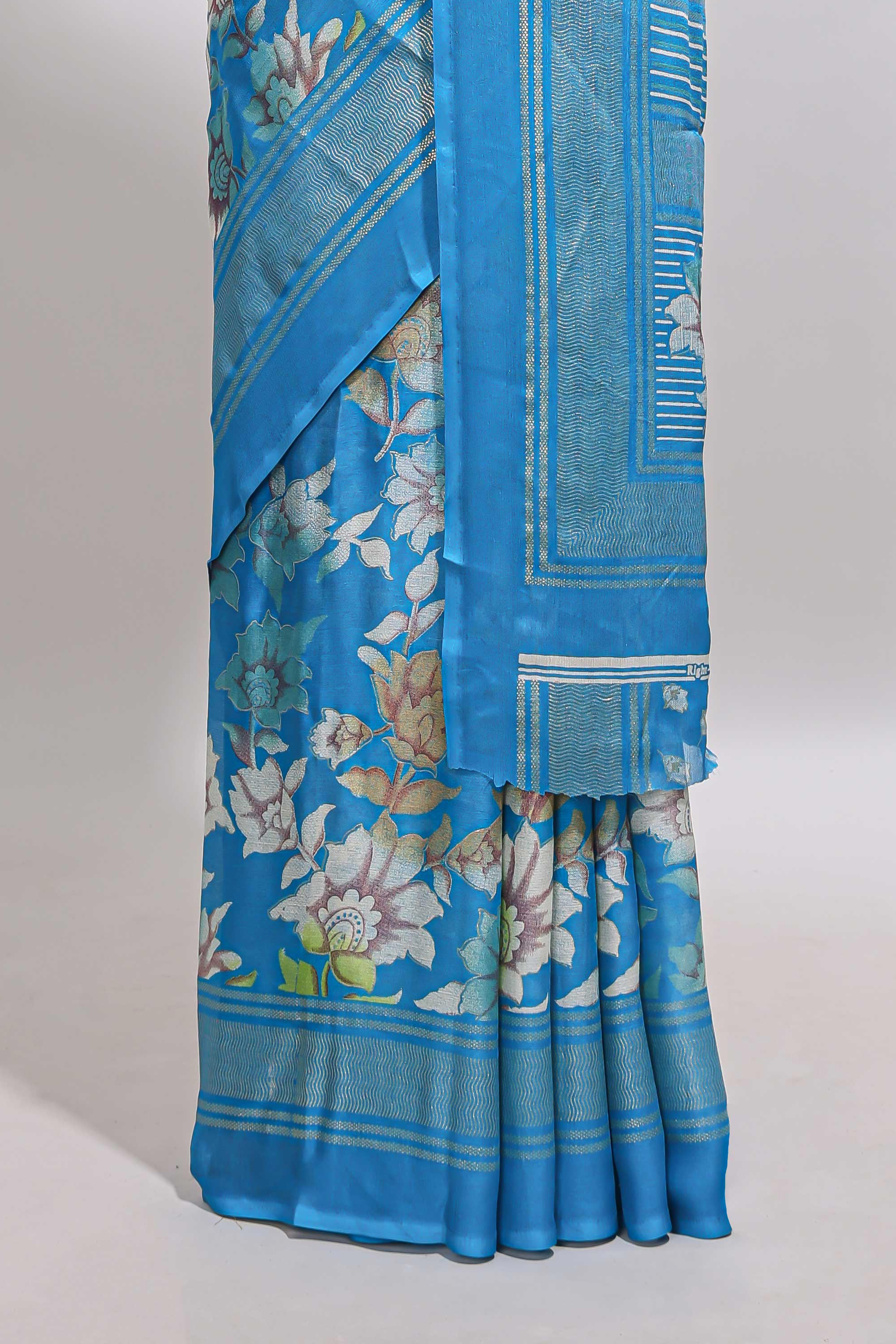 Sky blue floral design chiffon saree with self border and matching blouse