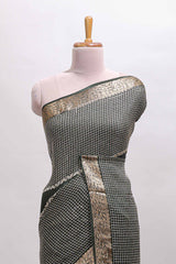 Black checked floral motifs chiffon saree with self zari border and contrast blouse