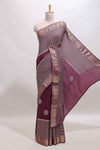 Purple checked floral motifs chiffon saree with self zari border and contrast blouse