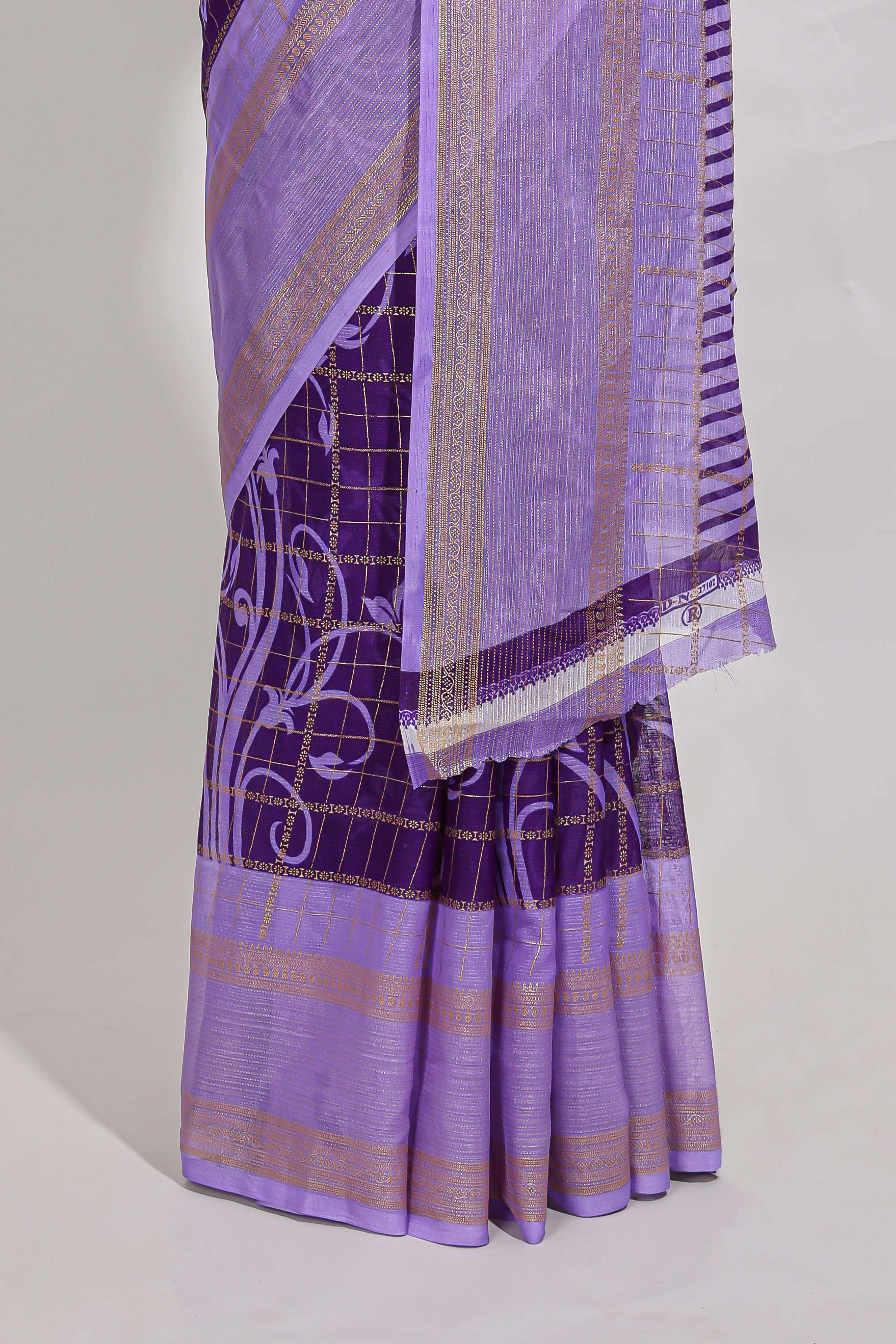 Purple checked floral motifs chiffon saree with self zari border and contrast pallu and blouse